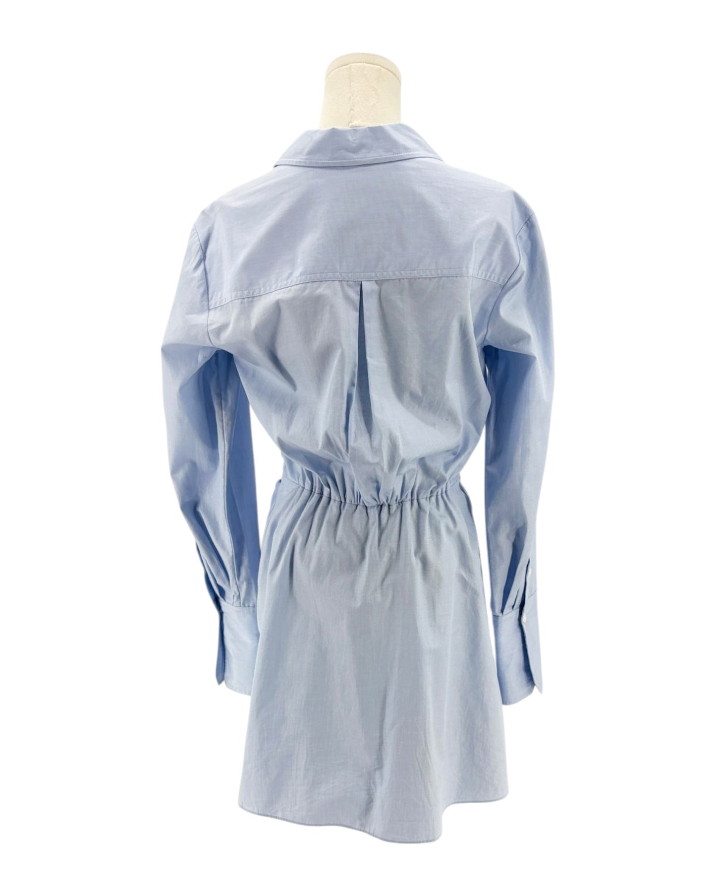Light blue long sleeve mini dress on a mannequin on a white background
