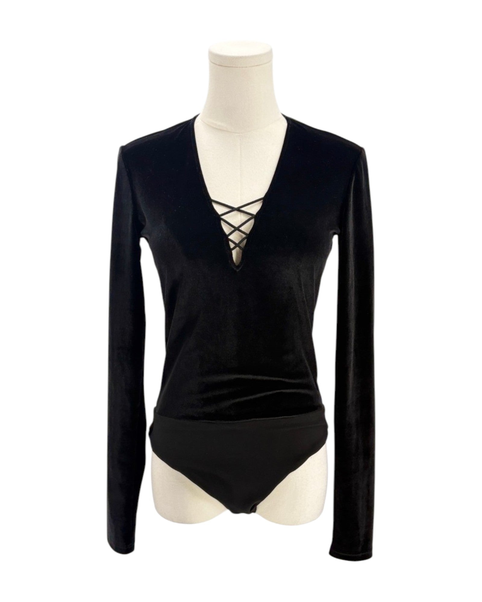Black long sleeve bodysuit on a mannequin on a white background