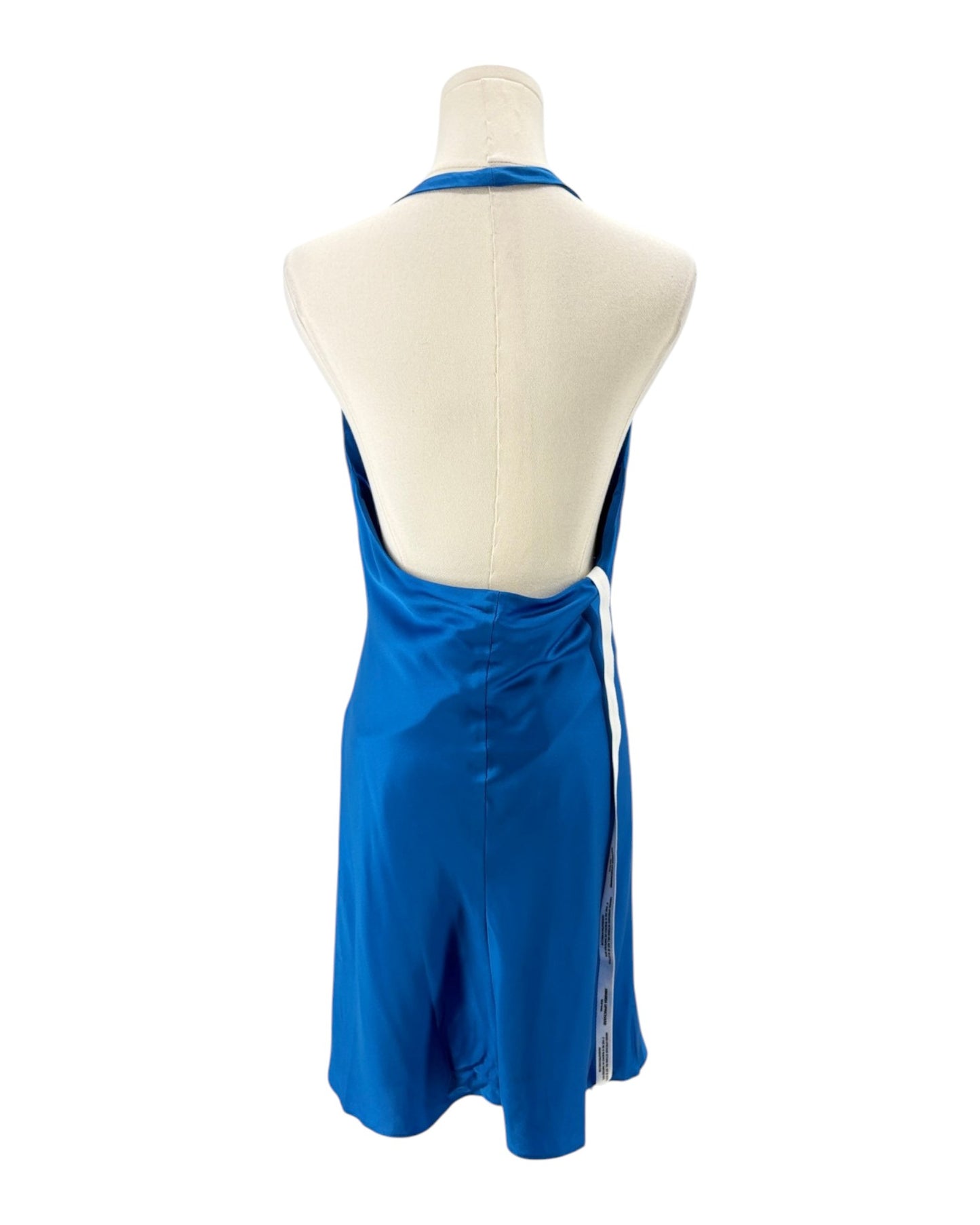 Blue dress on a mannequin against a white background