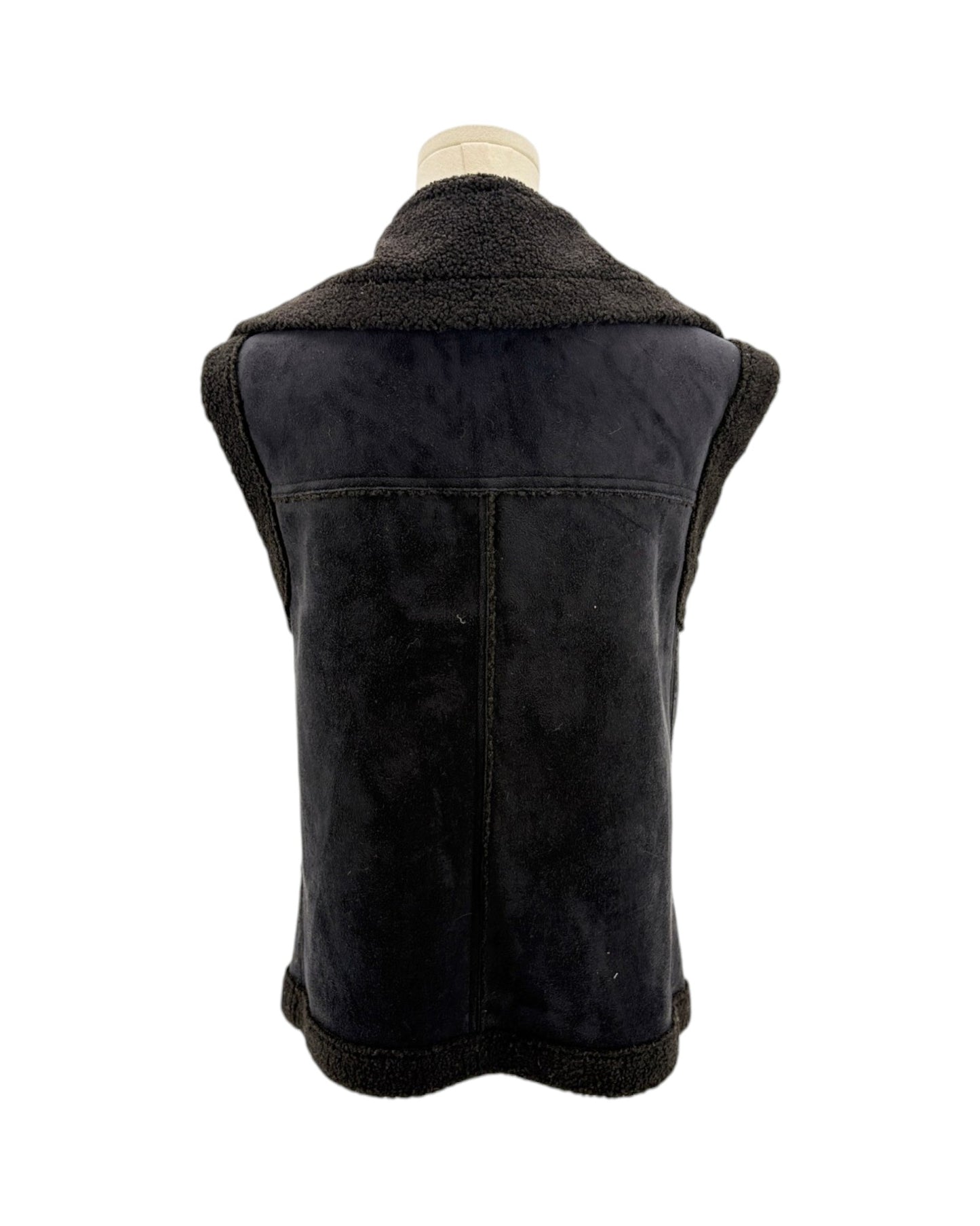Black vest with shearling collar on a mannequin against a white background
