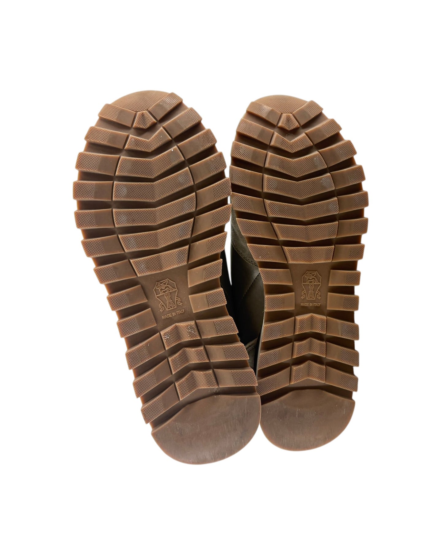 Brown rubber sole of a shoe on a white background