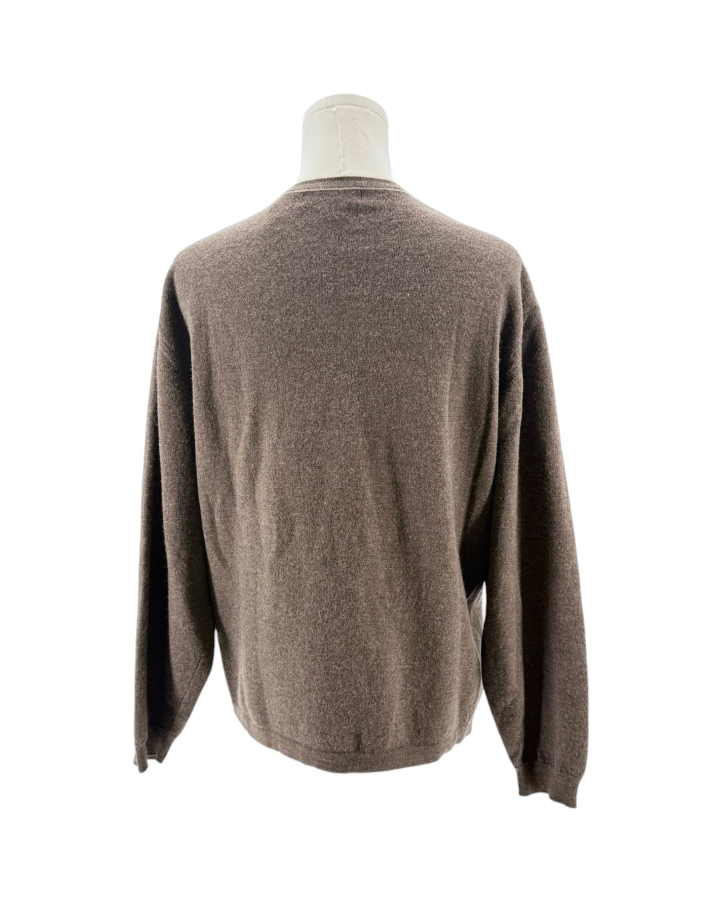 Brown sweater on a mannequin against a white background