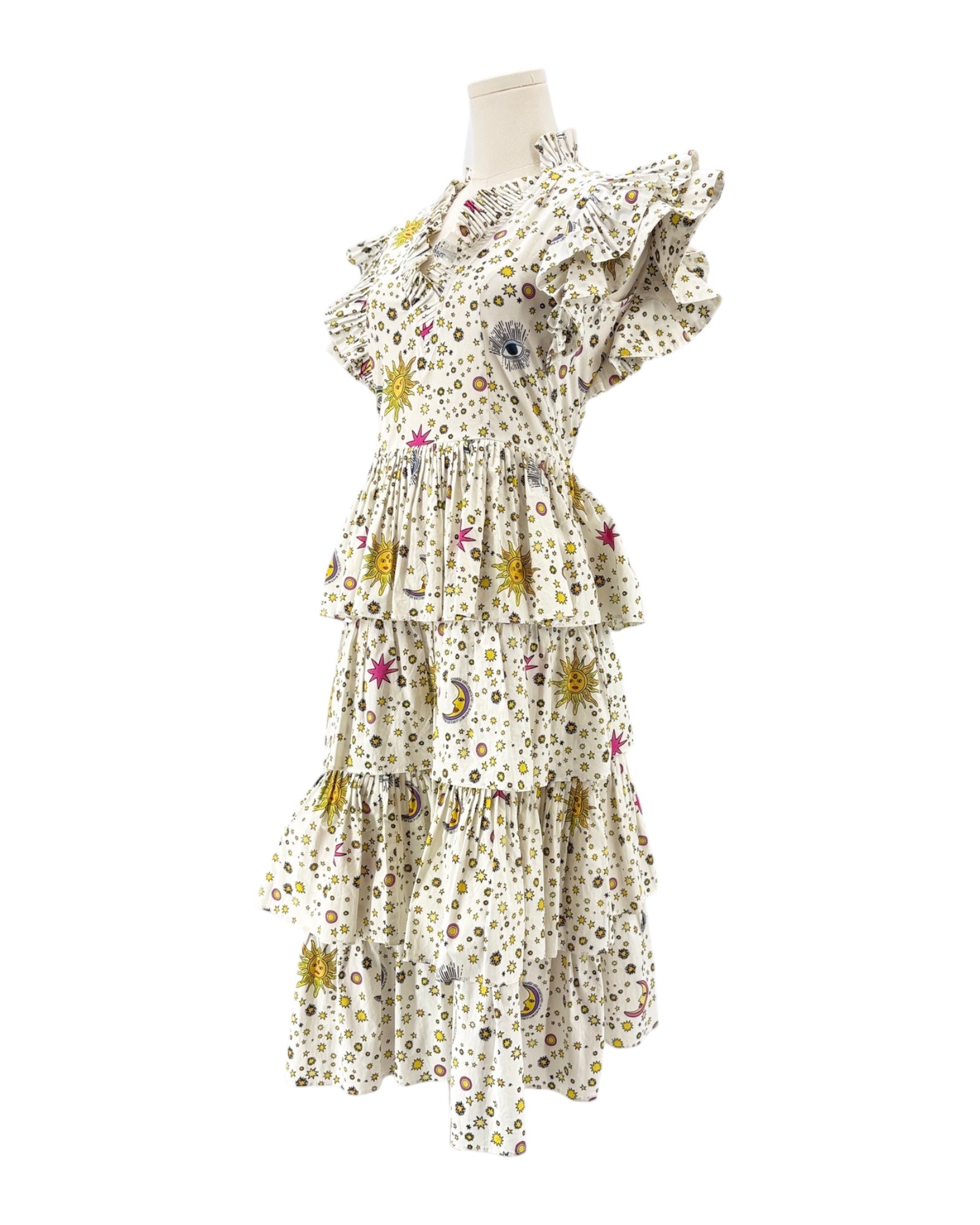 Celia B Sun and stars white dress on a mannequin against a white background
