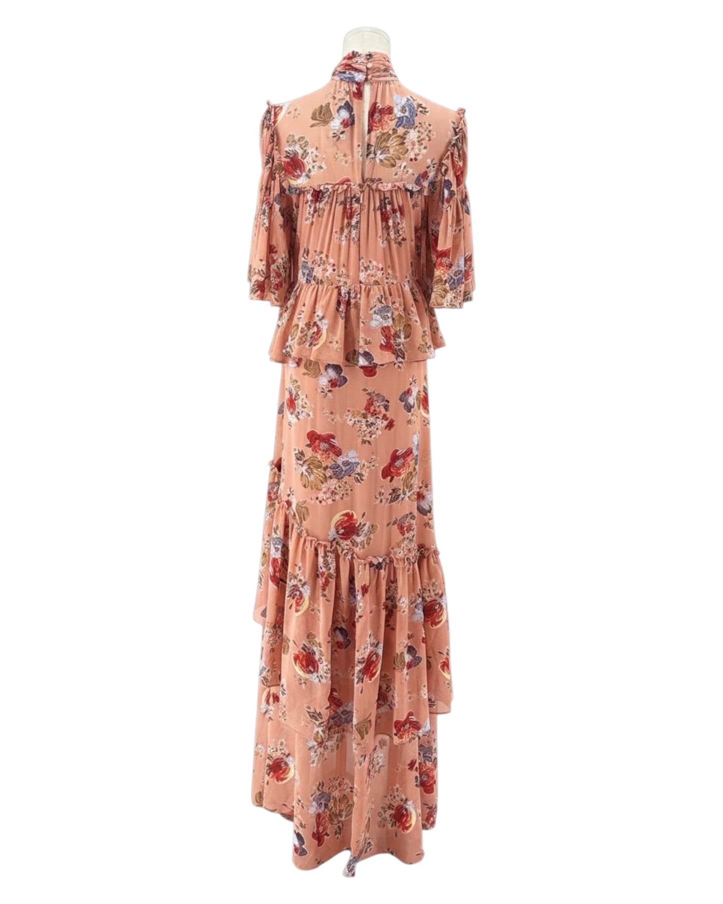 Floral dress on a mannequin against a white background