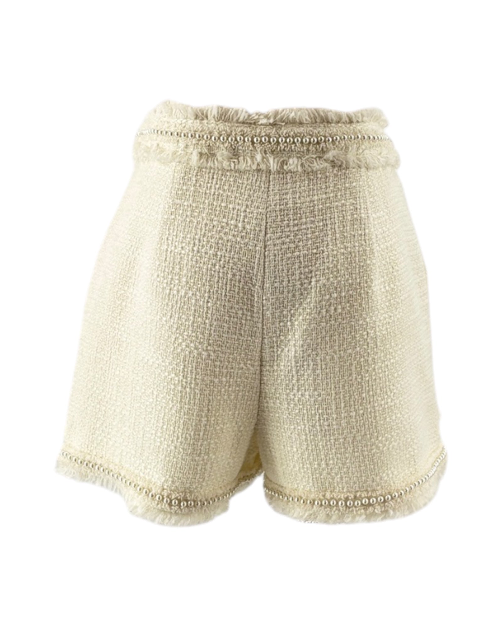 Cinq a Sept white shorts with textured tweed fabric on a white background