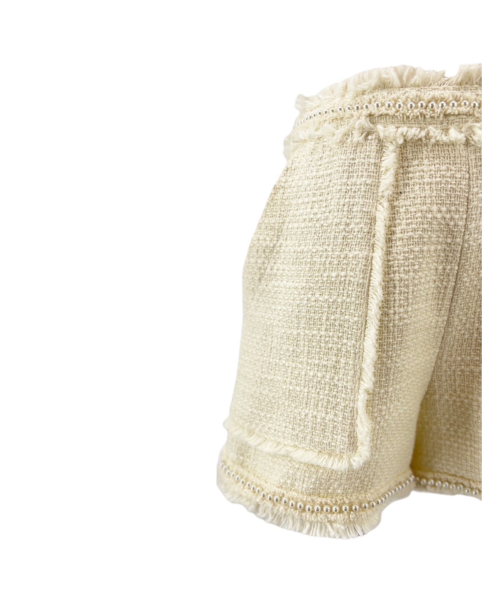 Cinq a Sept white shorts with textured tweed fabric on a white background