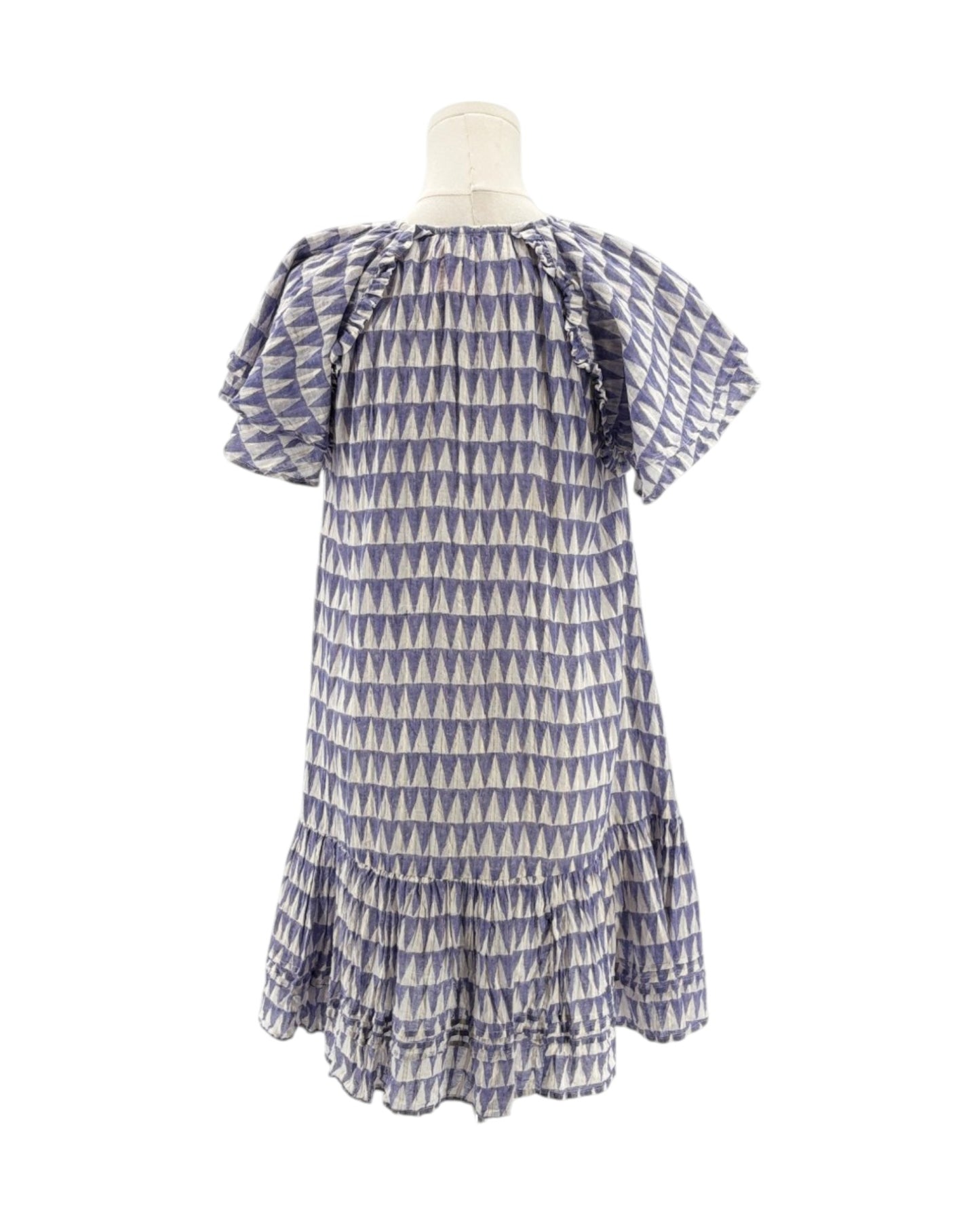 Blue and white patterned dress on a mannequin against a white background