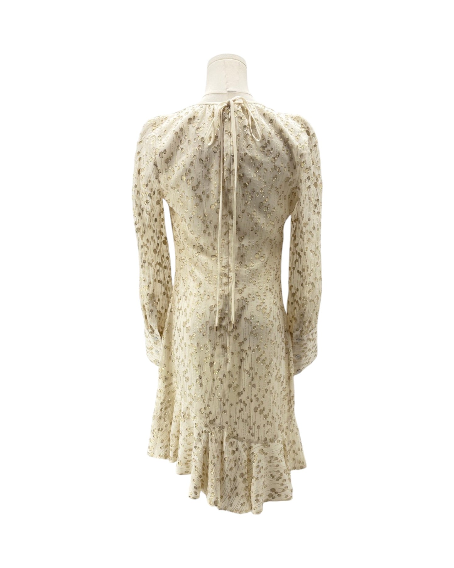White dress on a mannequin against a white background