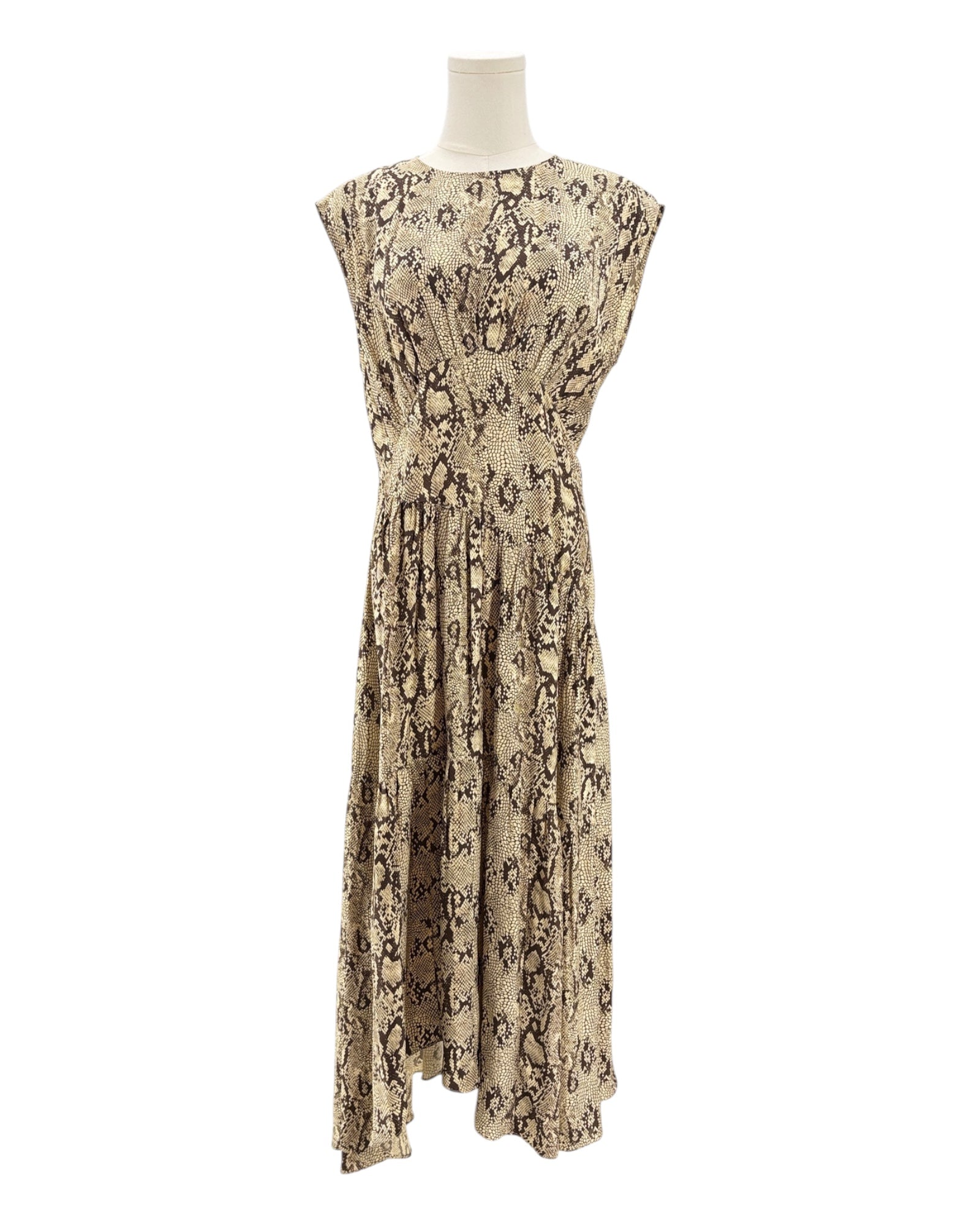 Snakeskin patterned dress on a mannequin against a white background