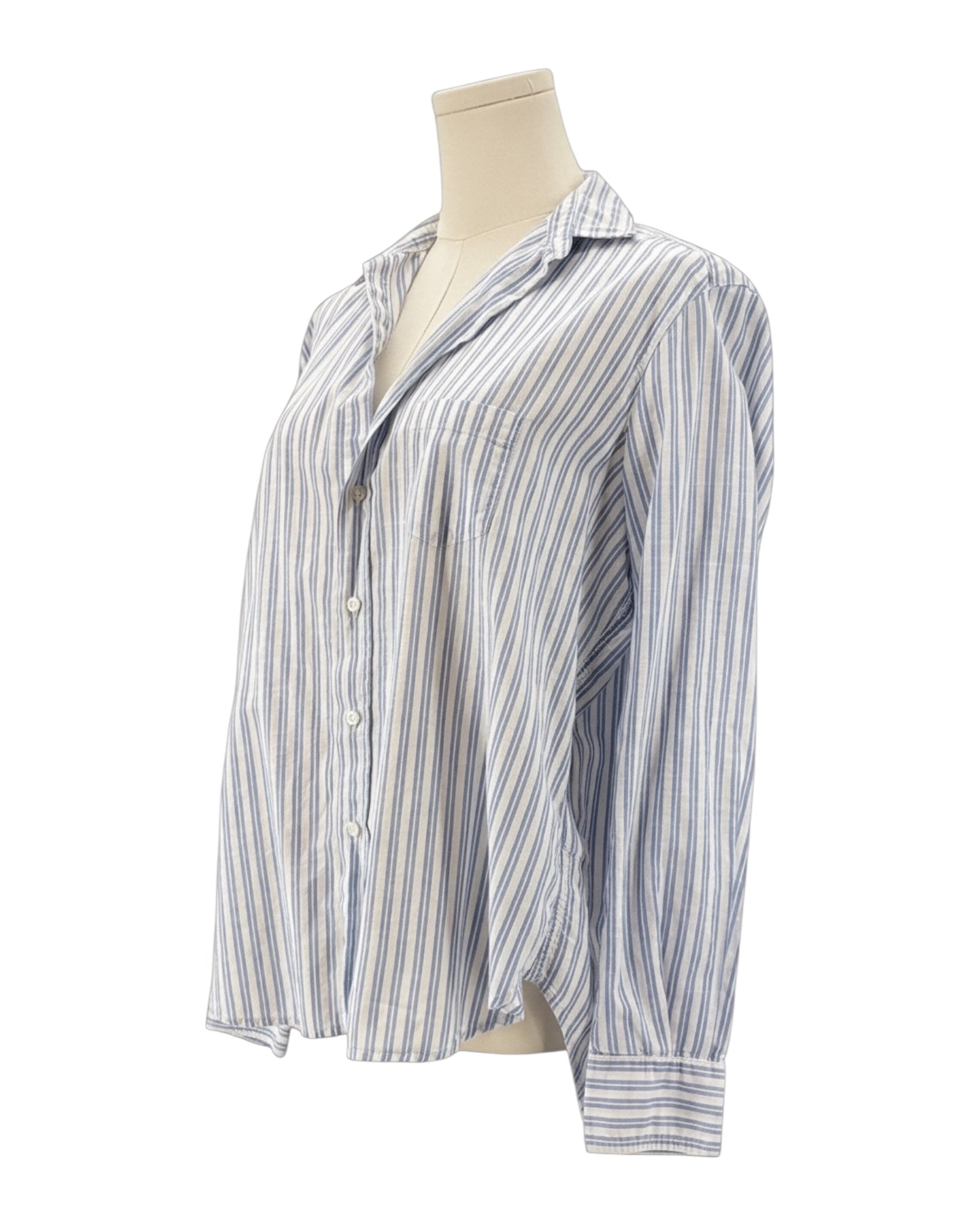 Striped shirt on a mannequin against a white background