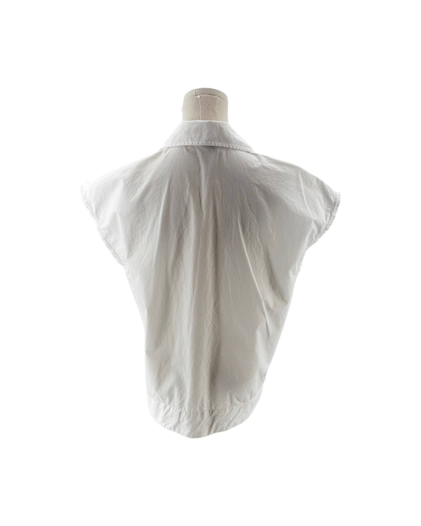 White shirt on a mannequin against a white background