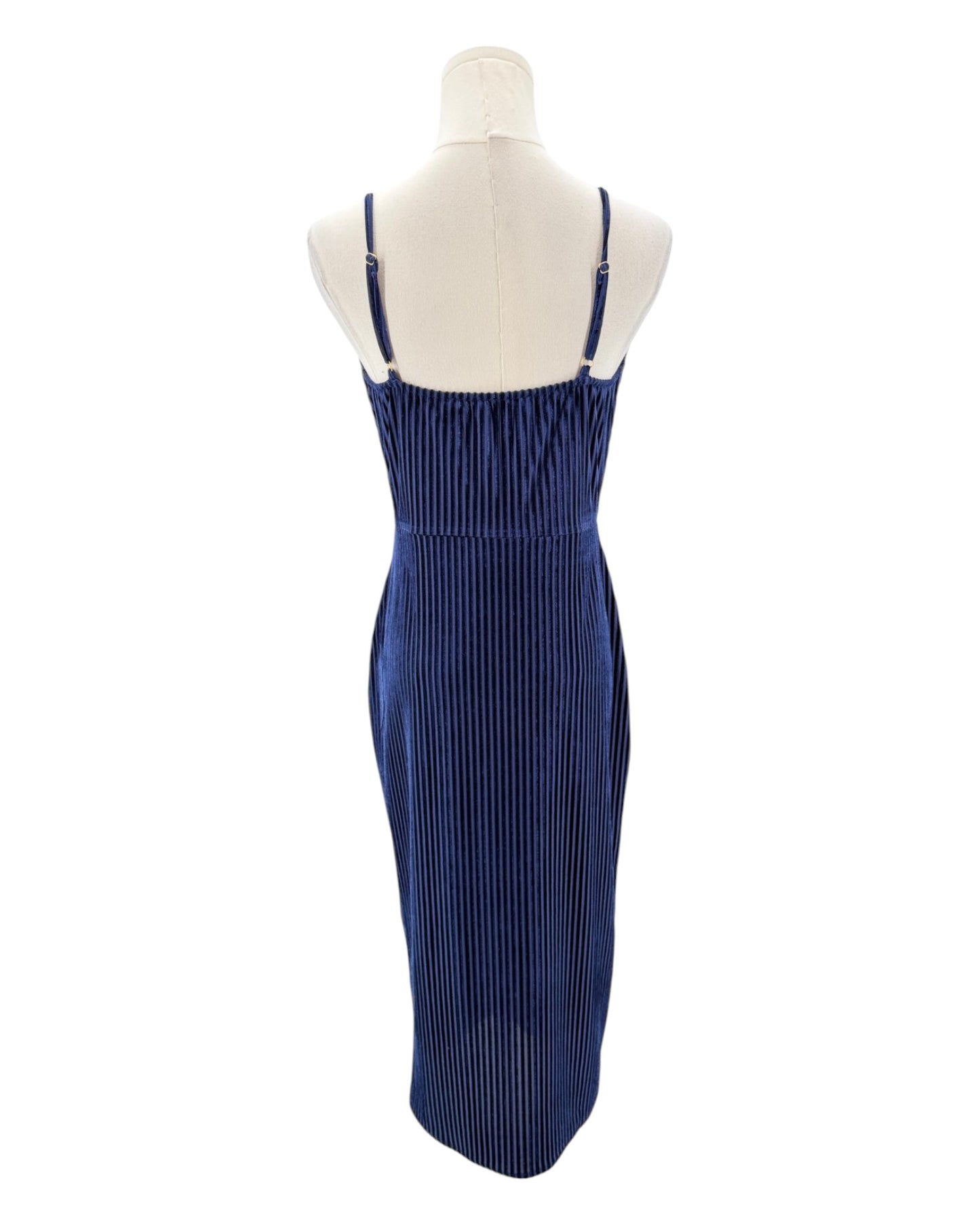 Blue ribbed dress on a mannequin against a white background
