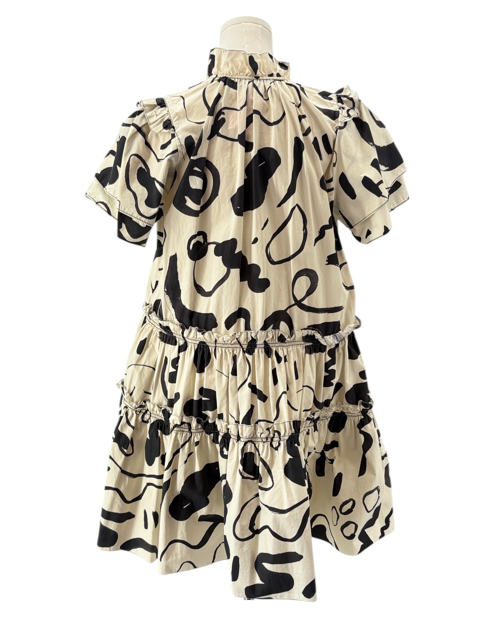 Hunter Bell beige with a black pattern mini dress