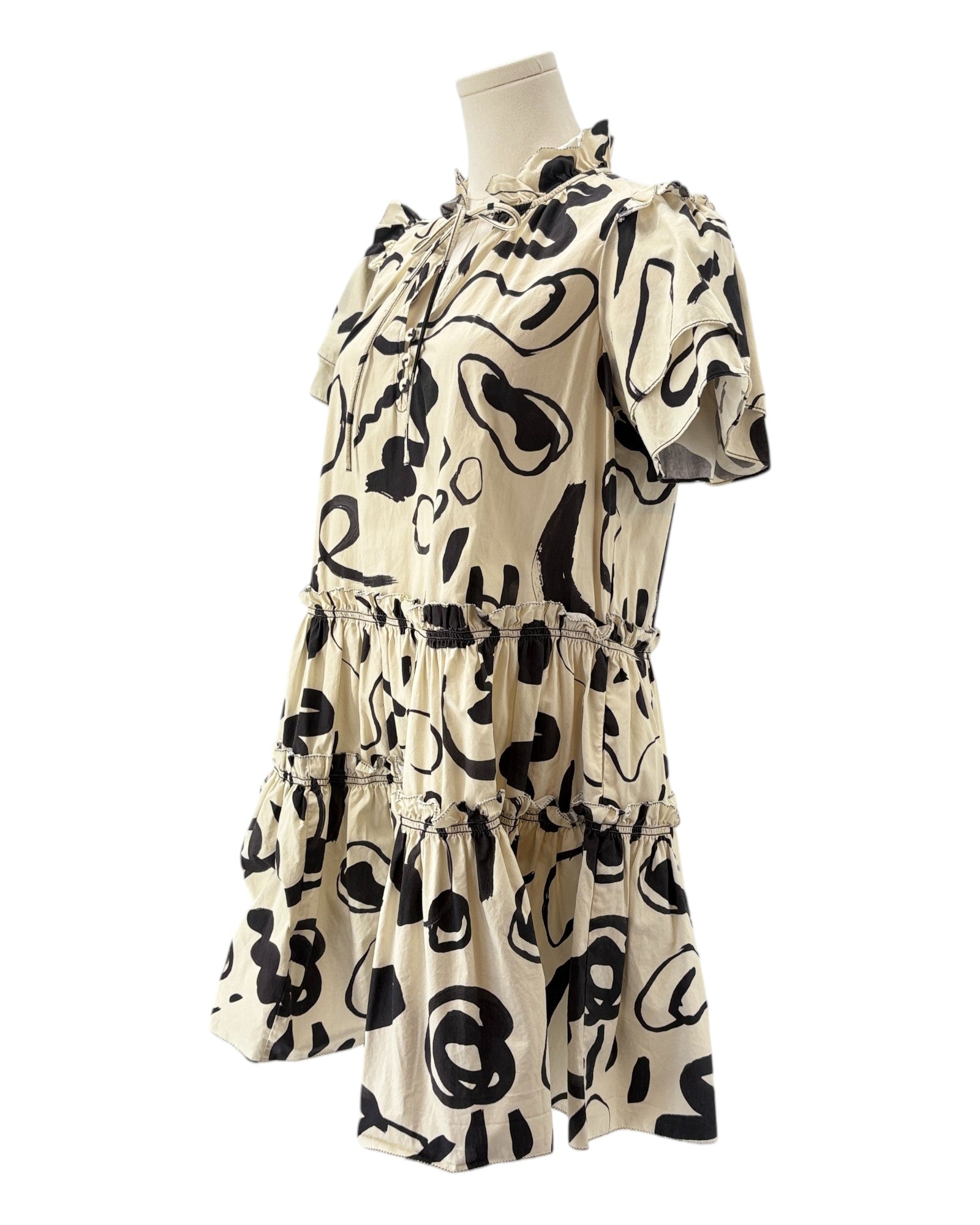 Hunter Bell beige with a black pattern mini dress