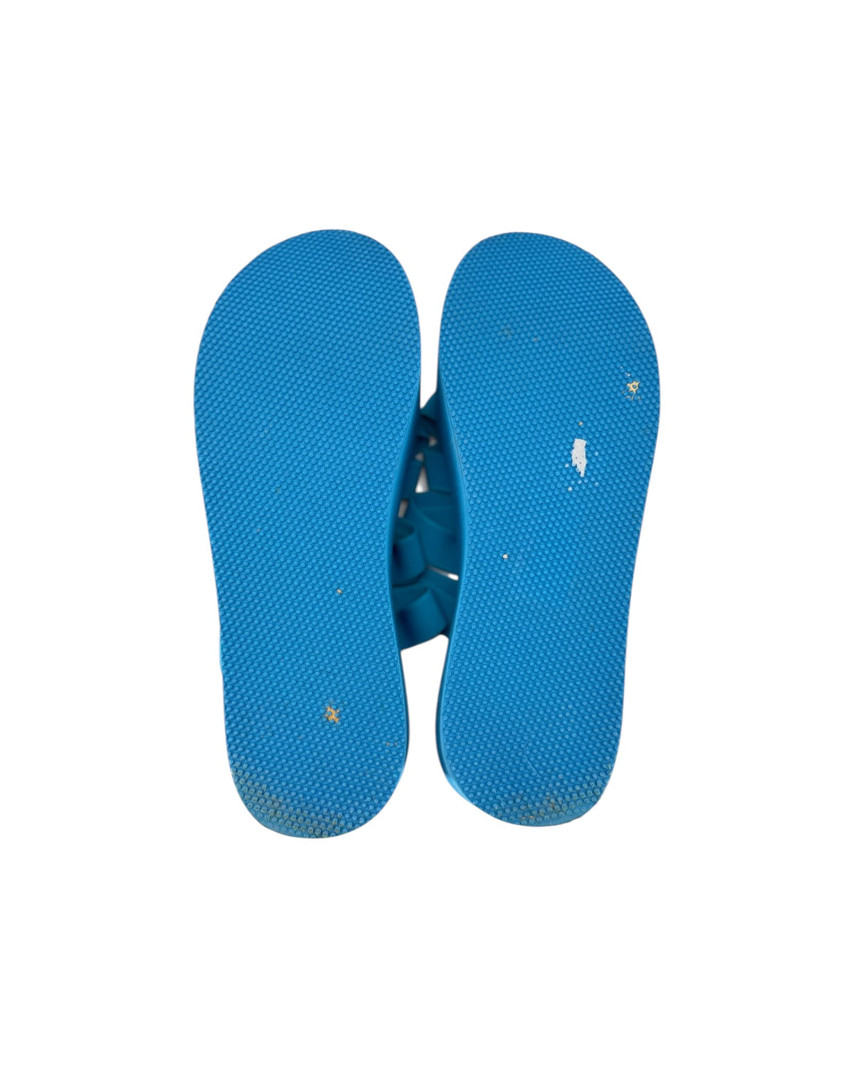 A pair of bright blue textured flip-flop sandals shown from a top-down view on a plain white background.