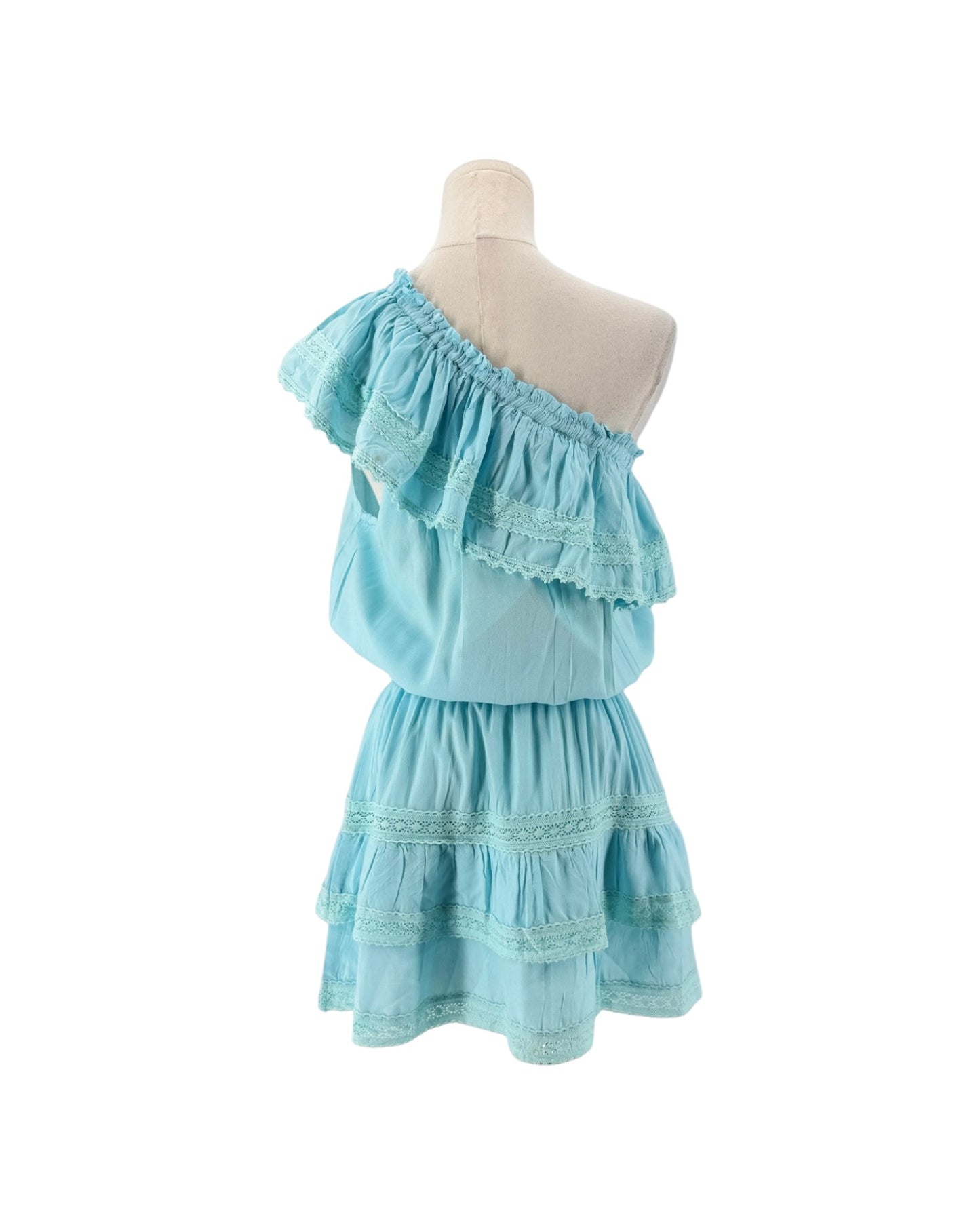 A light blue off-the-shoulder ruffled dress displayed on a cream dress form mannequin against a plain white background.