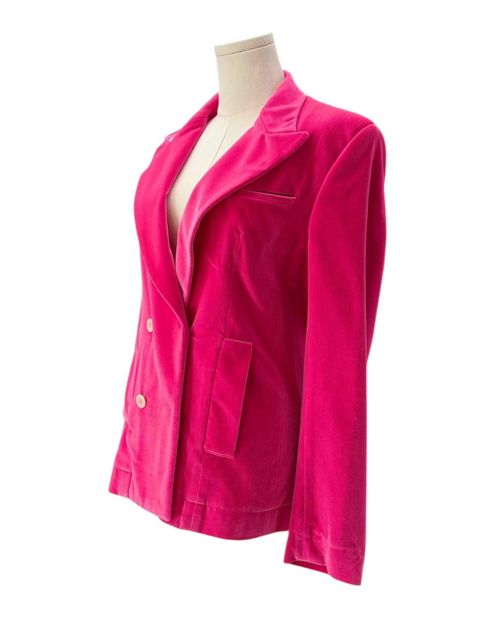 Pink jacket on a mannequin against a white background