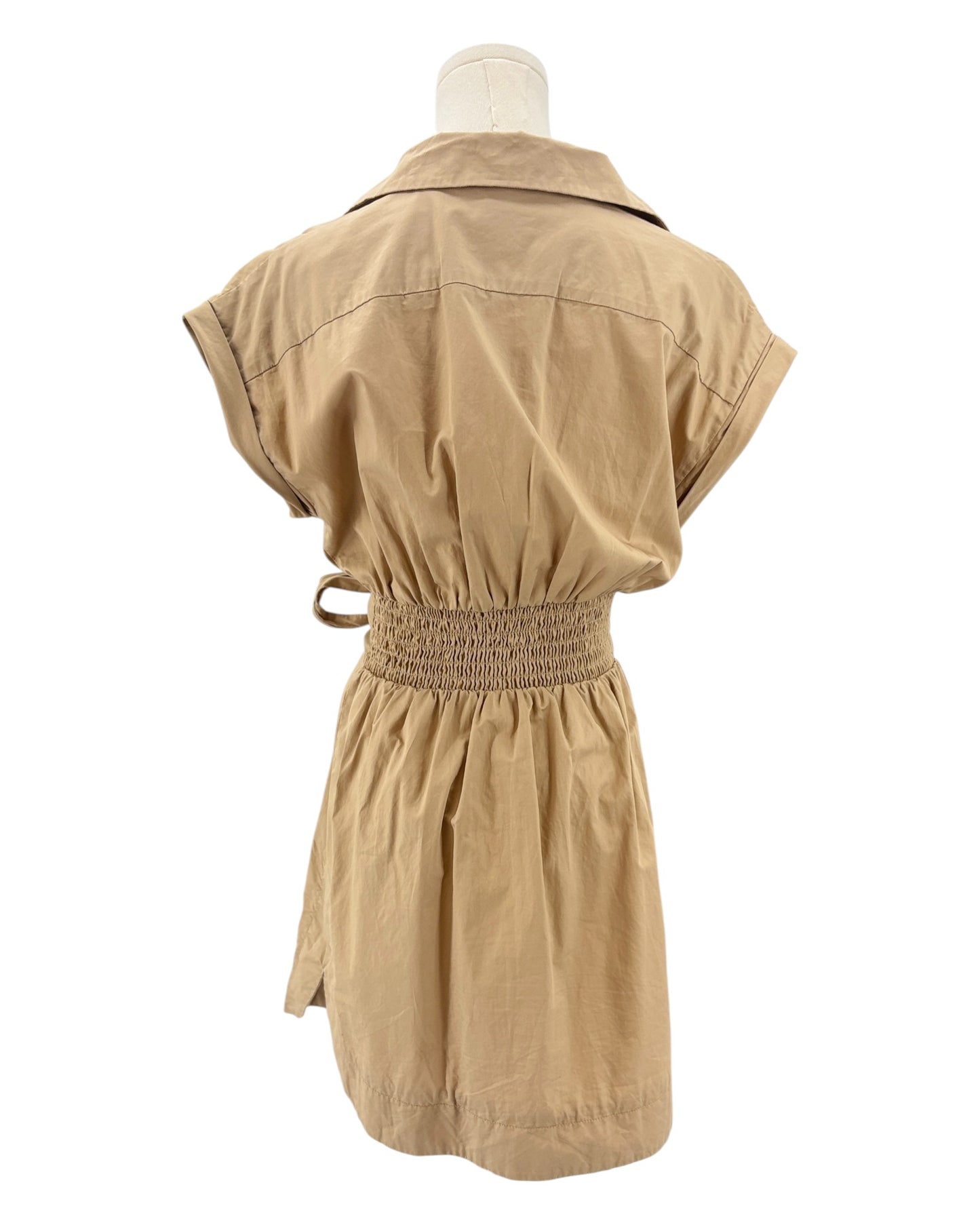 Beige mini dress on a mannequin against a white background