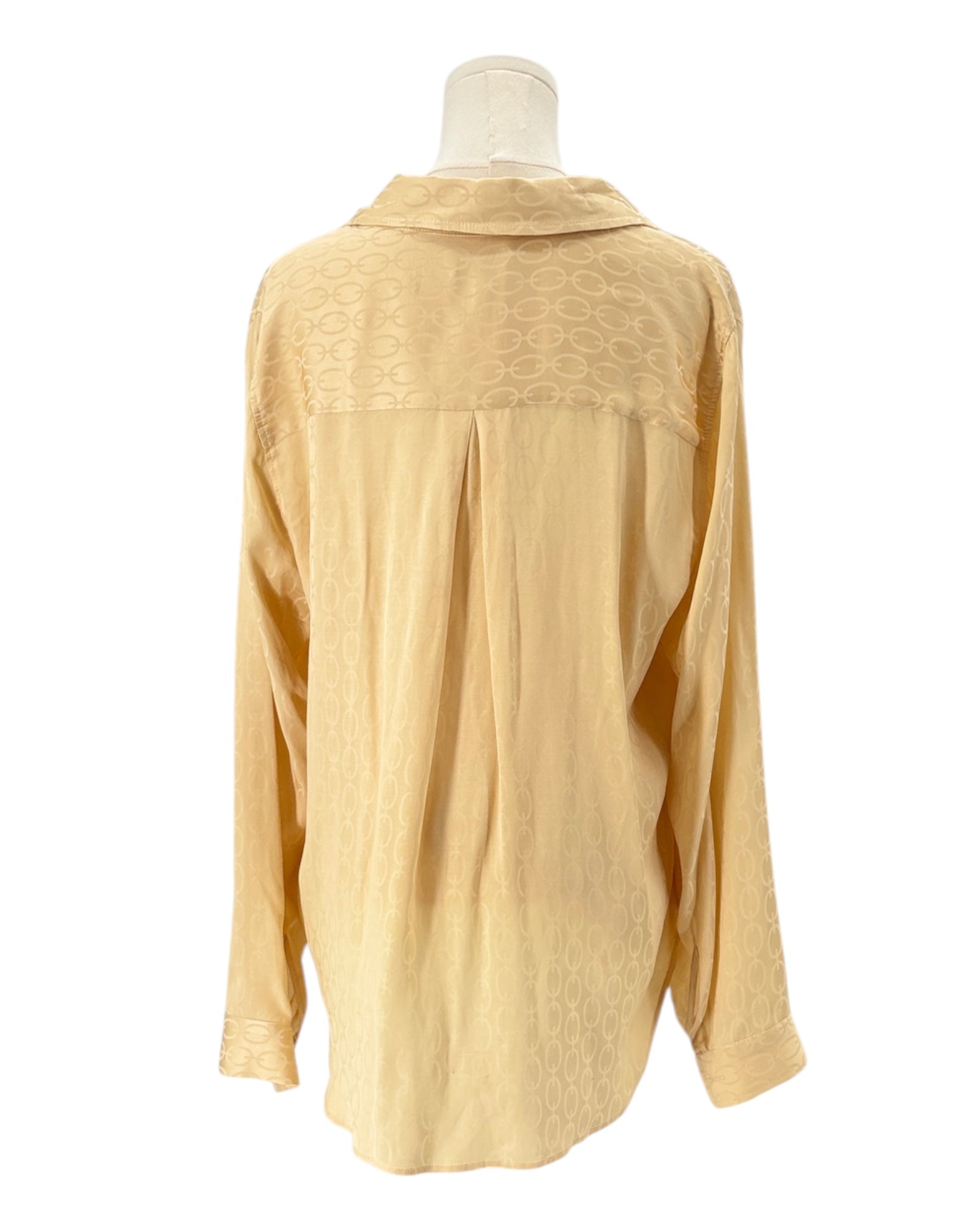 L'Agence shirt on a mannequin against a white background