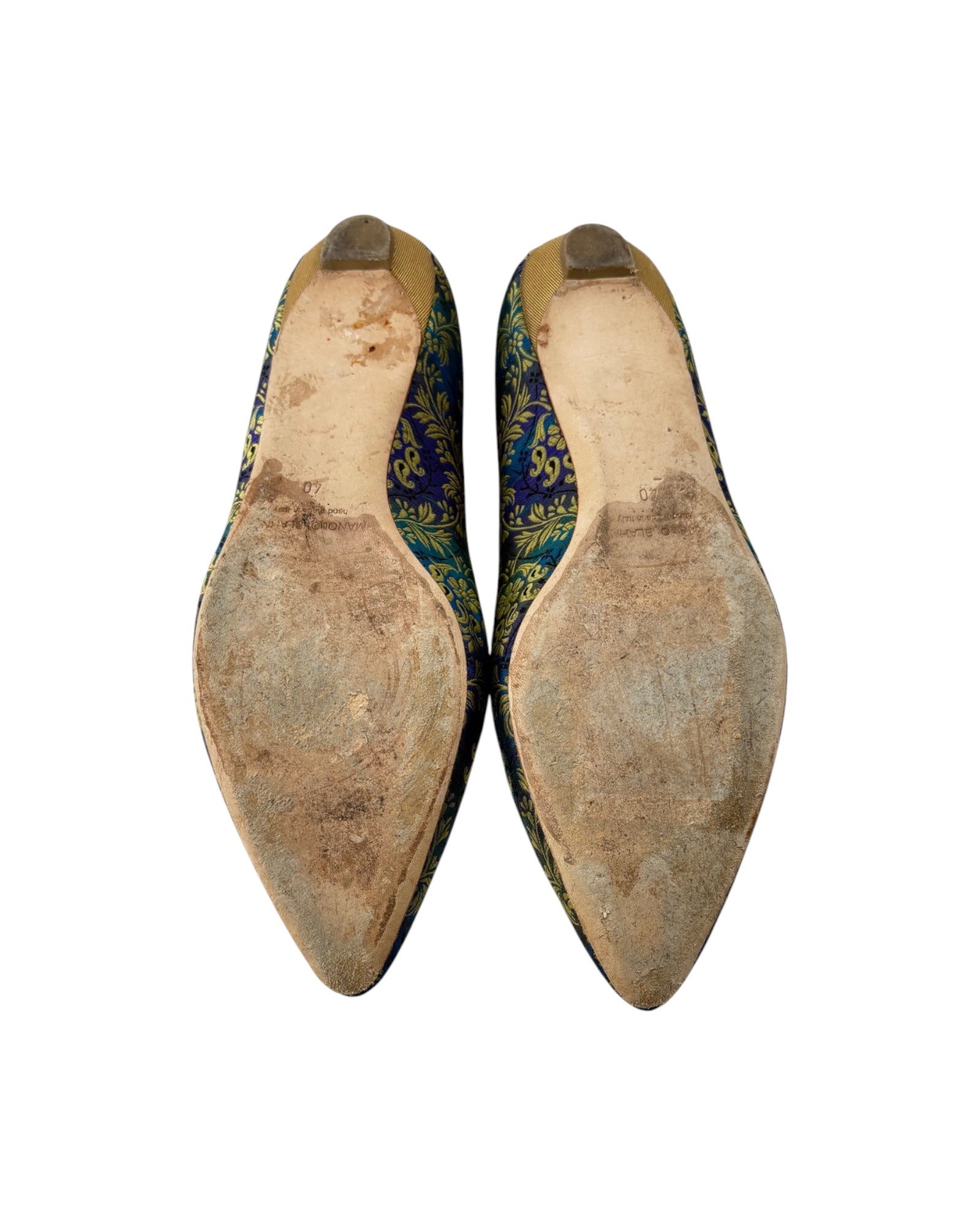 Pair of shoe soles with visible soles on a white background