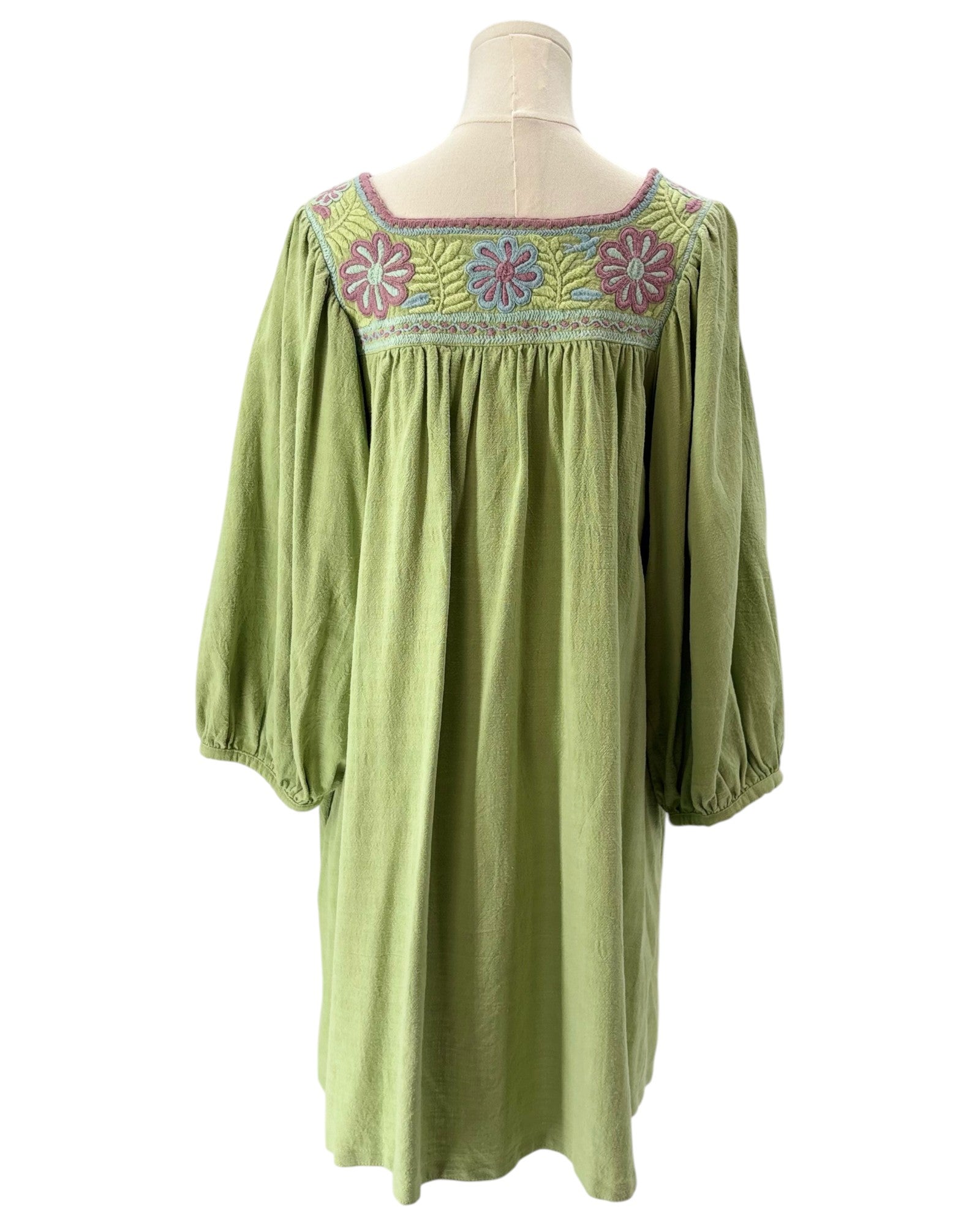 Mi Golondrina green dress with floral embroidery
