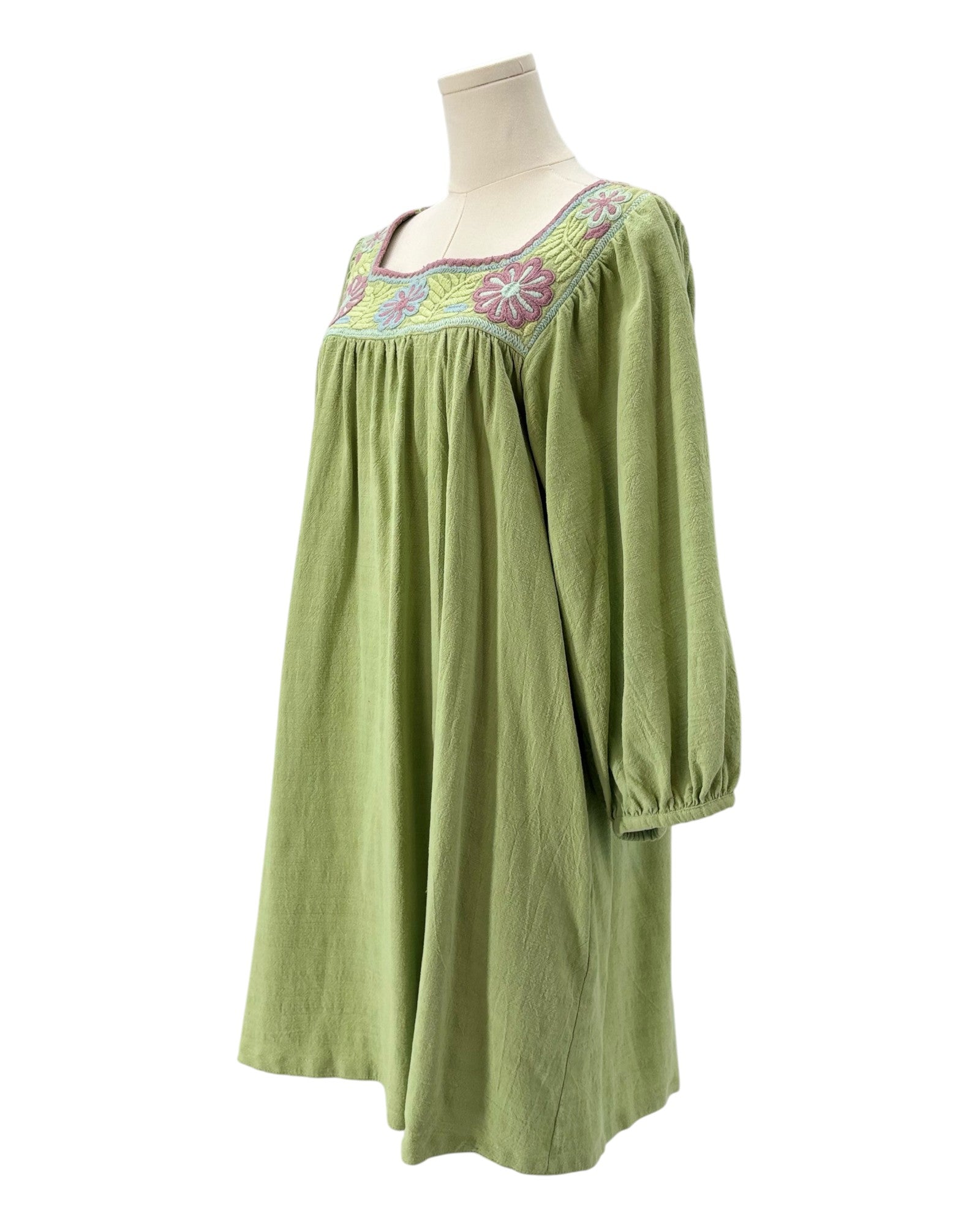 Mi Golondrina green dress with floral embroidery