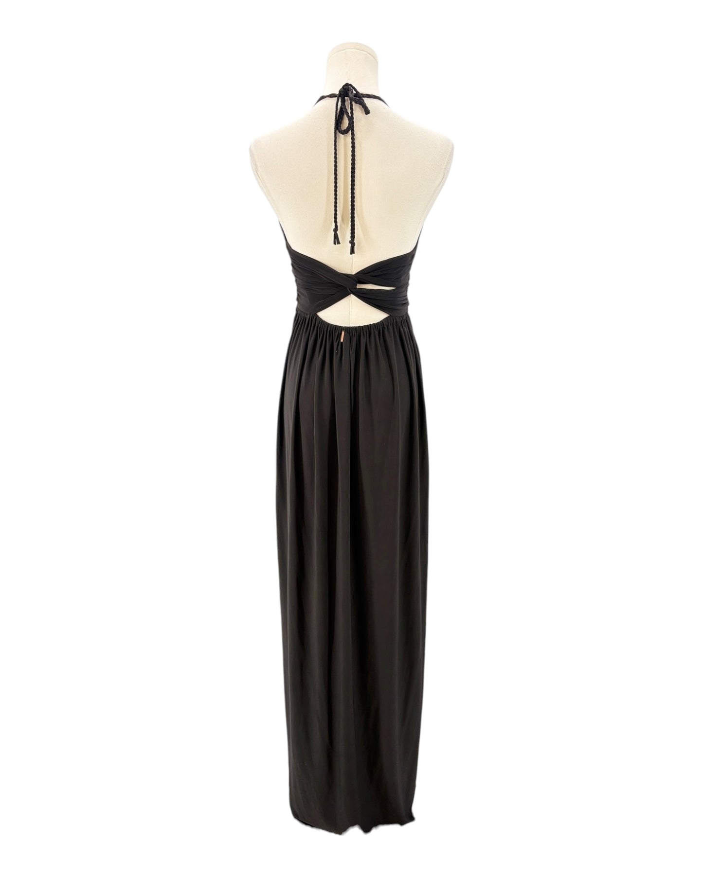 Black halter neck dress on a mannequin against a white background