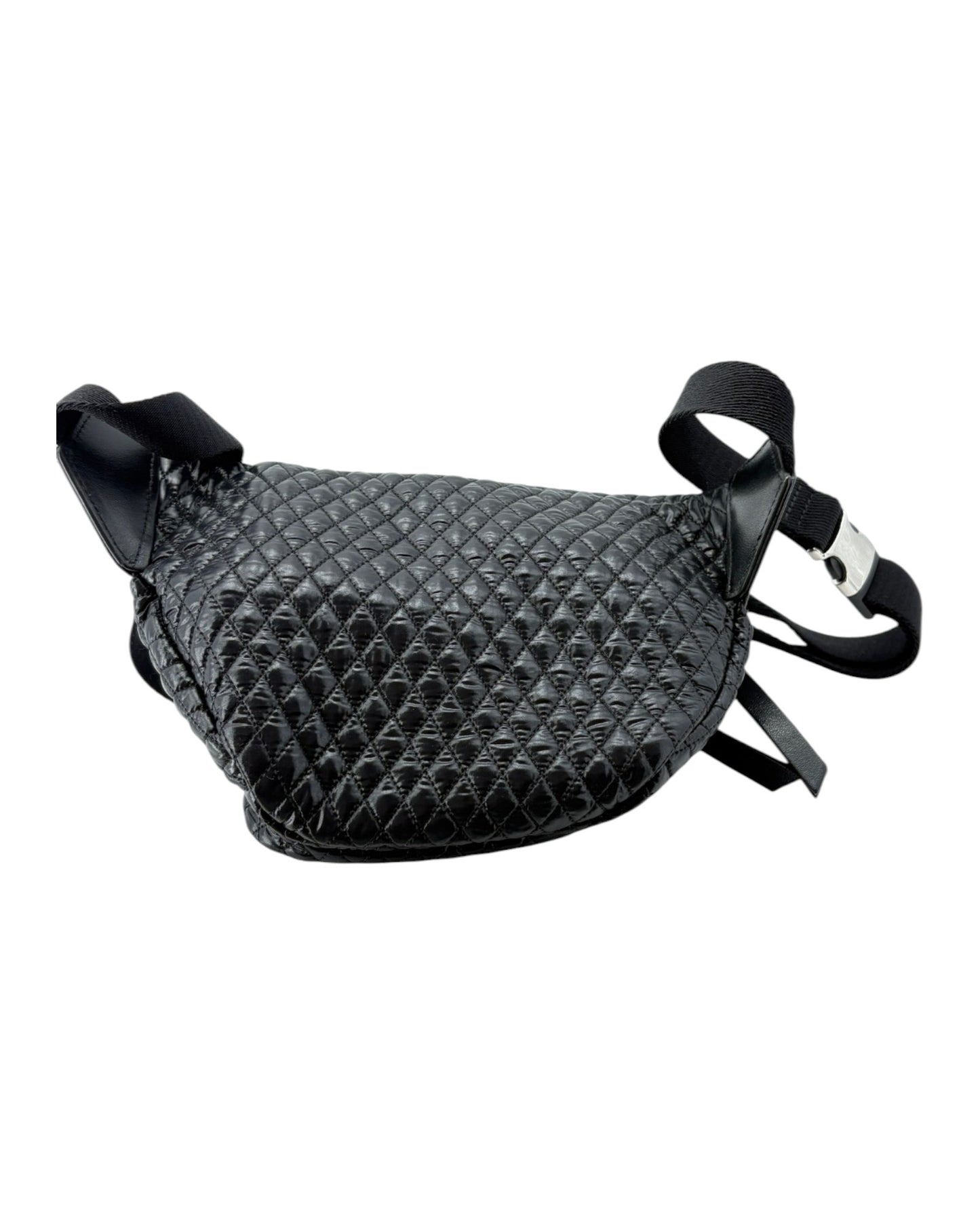 Black quilted leather bag with straps on a white background