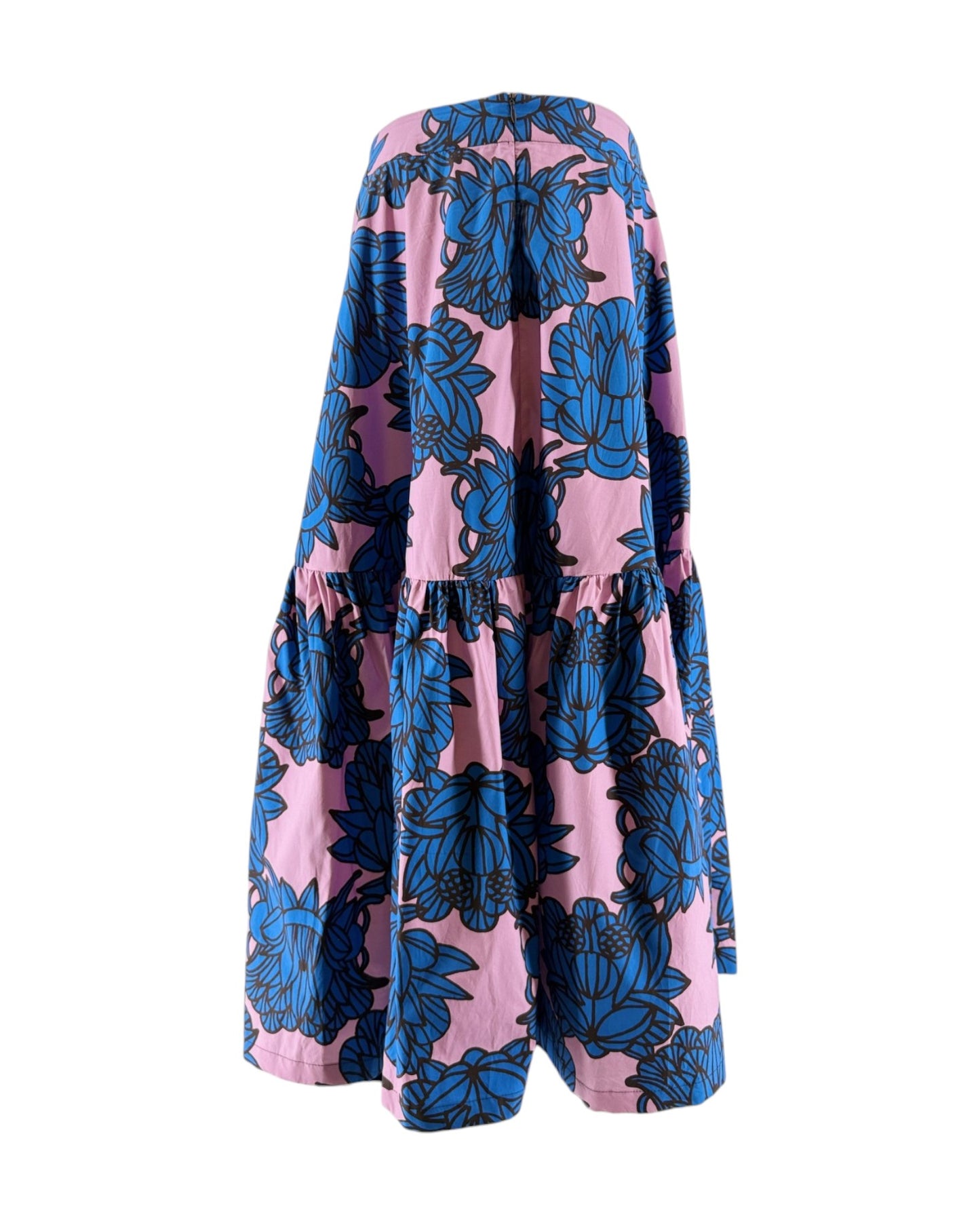 Pink dress with blue floral pattern on a white background