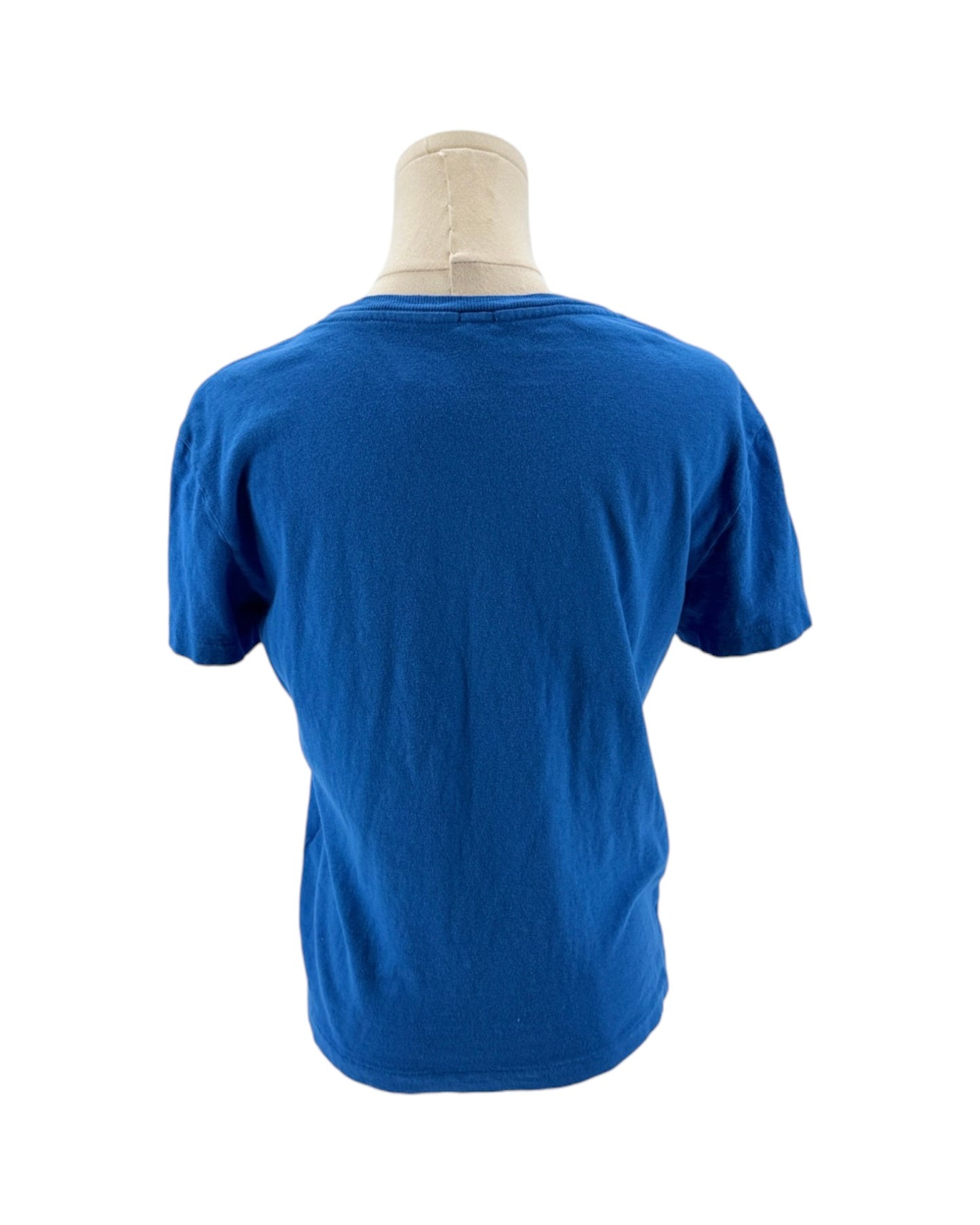 Blue t-shirt on a mannequin with a white background