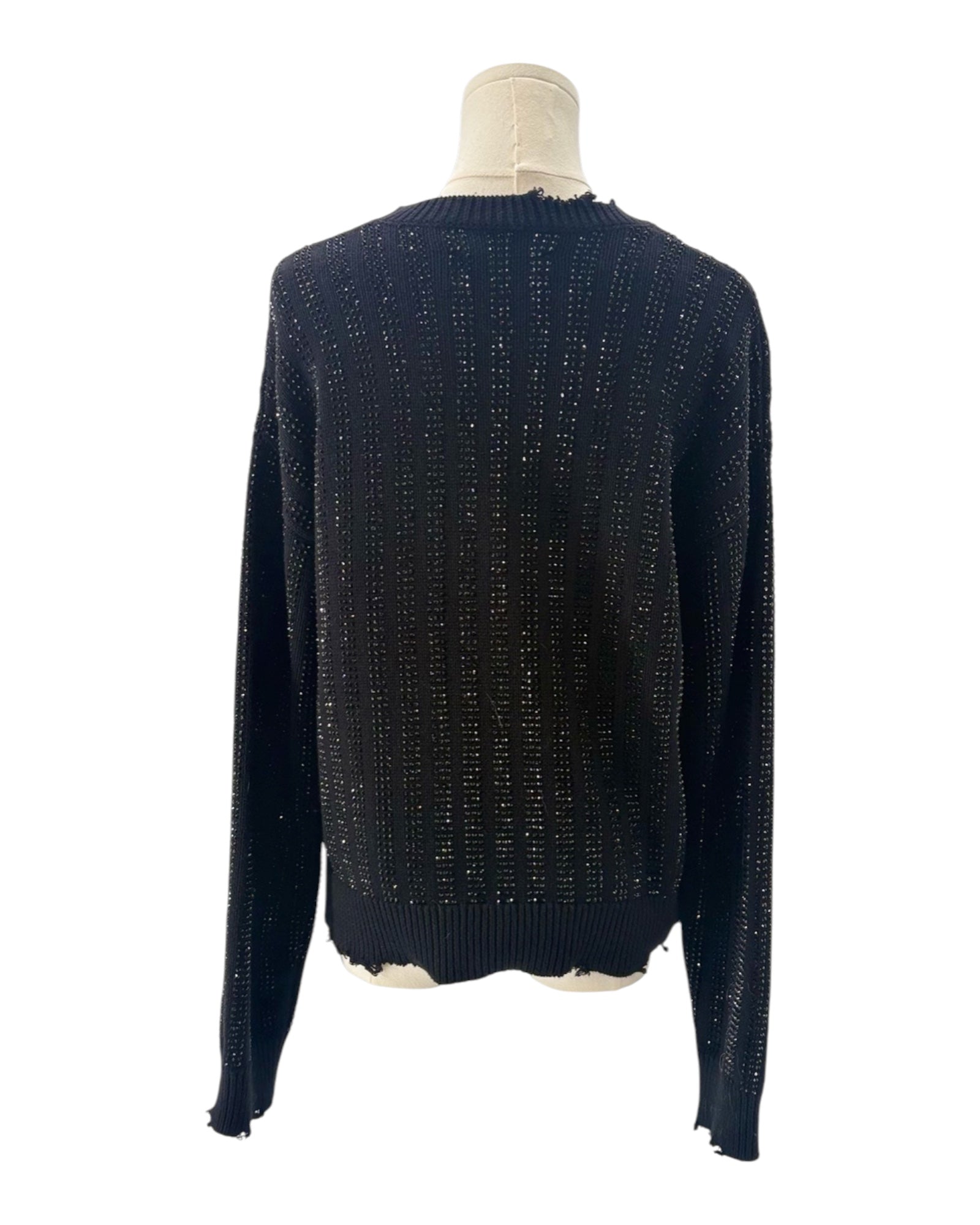 Embellished Sweater on a mannequin on white background