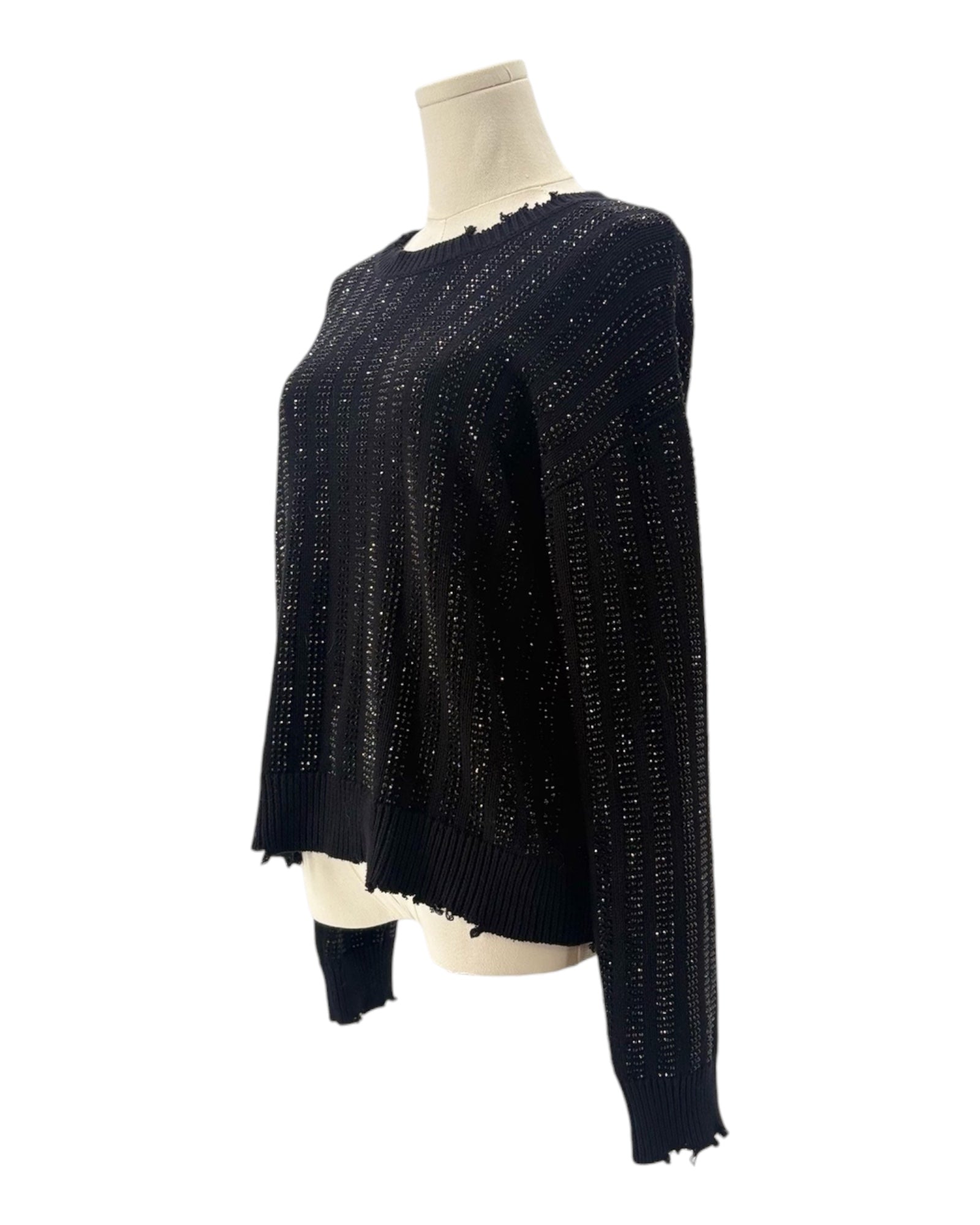 Embellished Sweater on a mannequin on white background