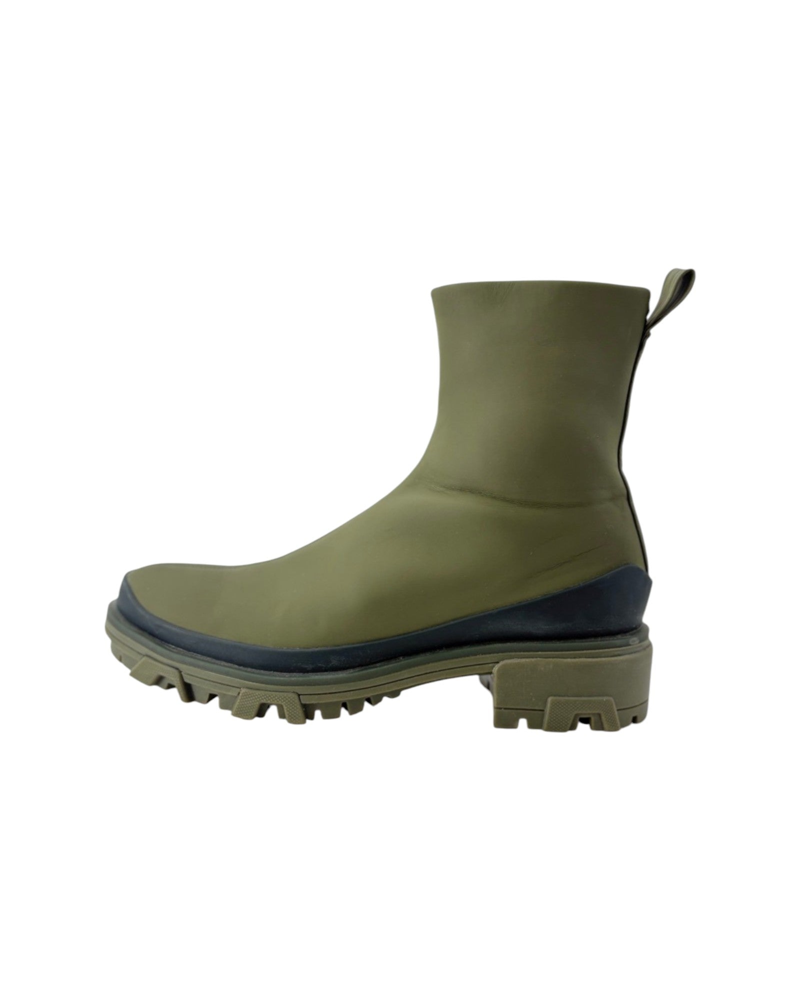 Green rubber boot with a black sole on a white background