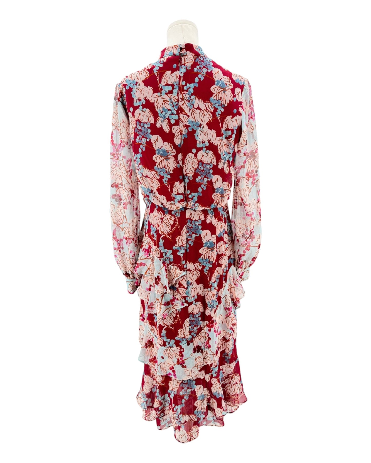 Red floral dress on a mannequin against a white background