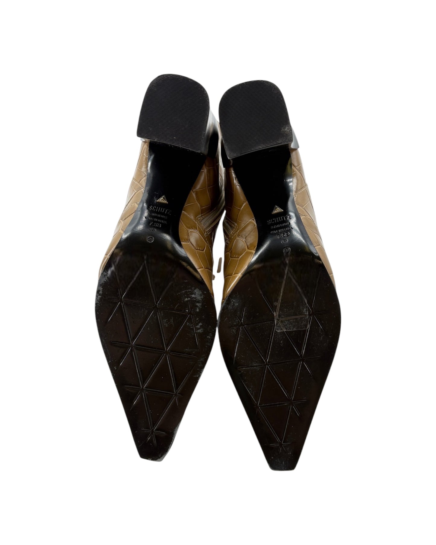 Pair of black pointed-toe shoes on a white background