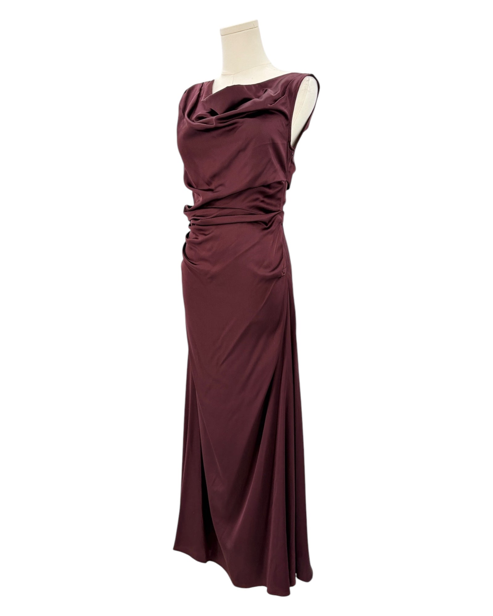 Staud maroon evening gown on a mannequin against a white background