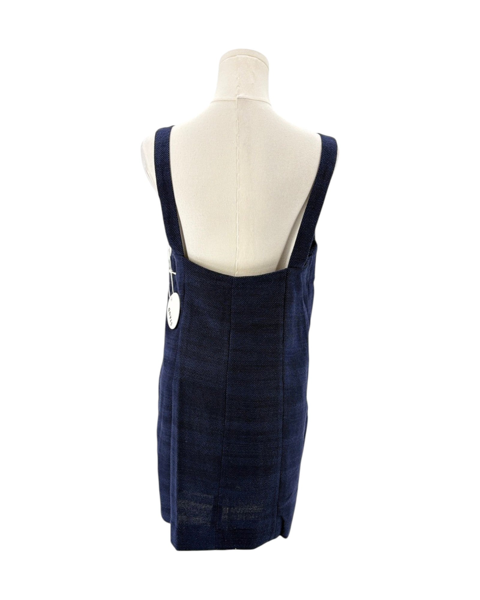Navy blue dress on a mannequin against a white background