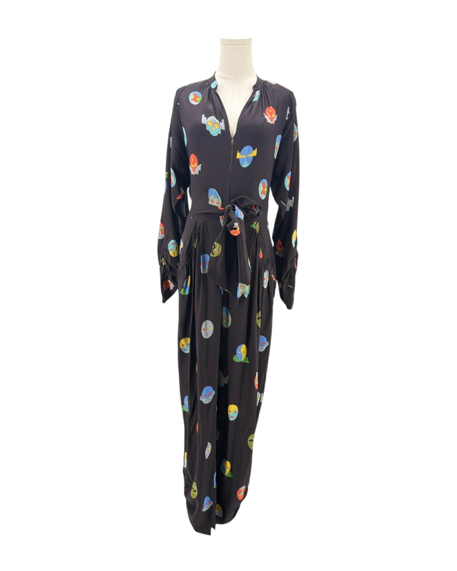 Black jumpsuit with colorful abstract patterns on a mannequin against a white background
