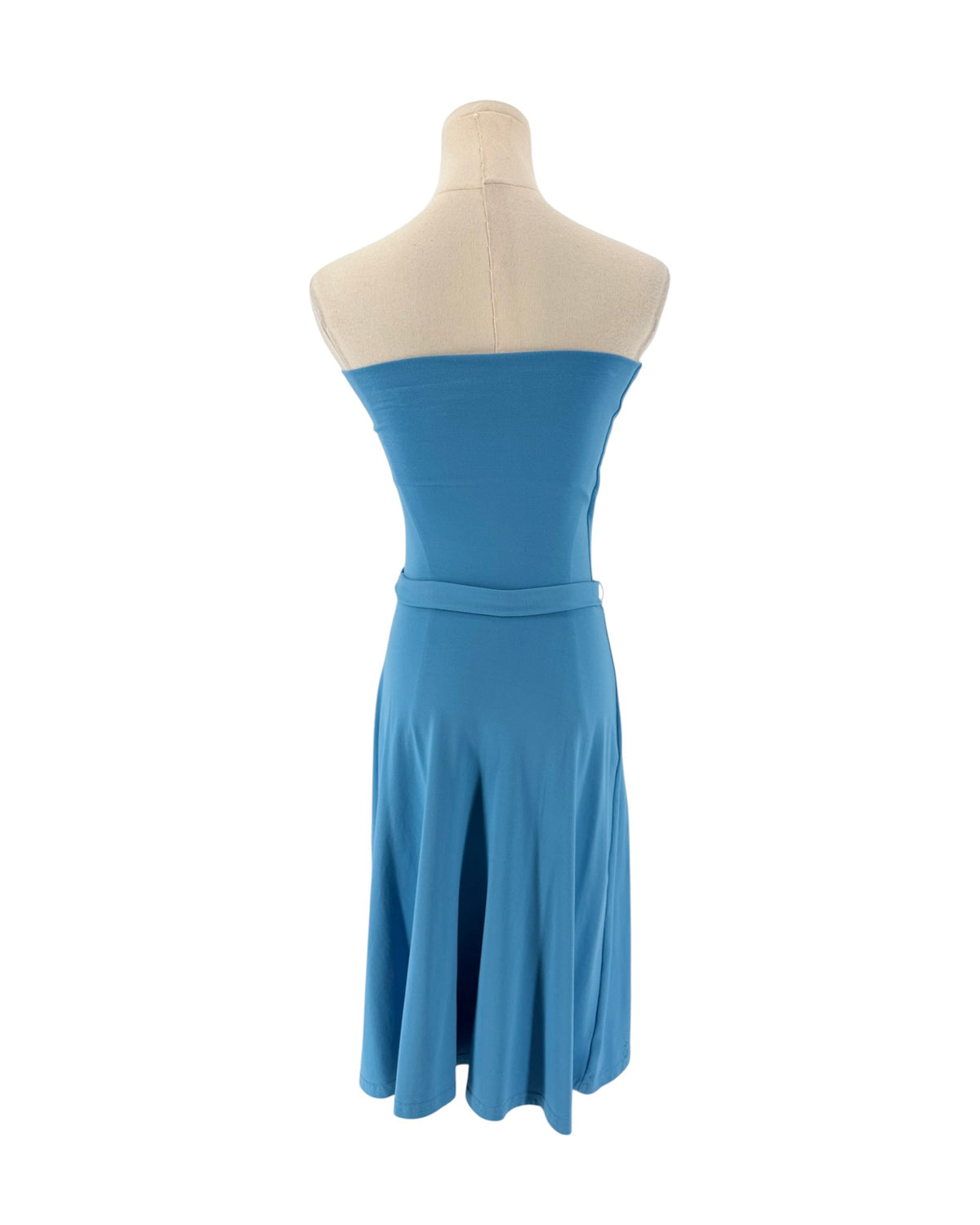A strapless blue dress displayed on a cream mannequin torso against a plain white background.