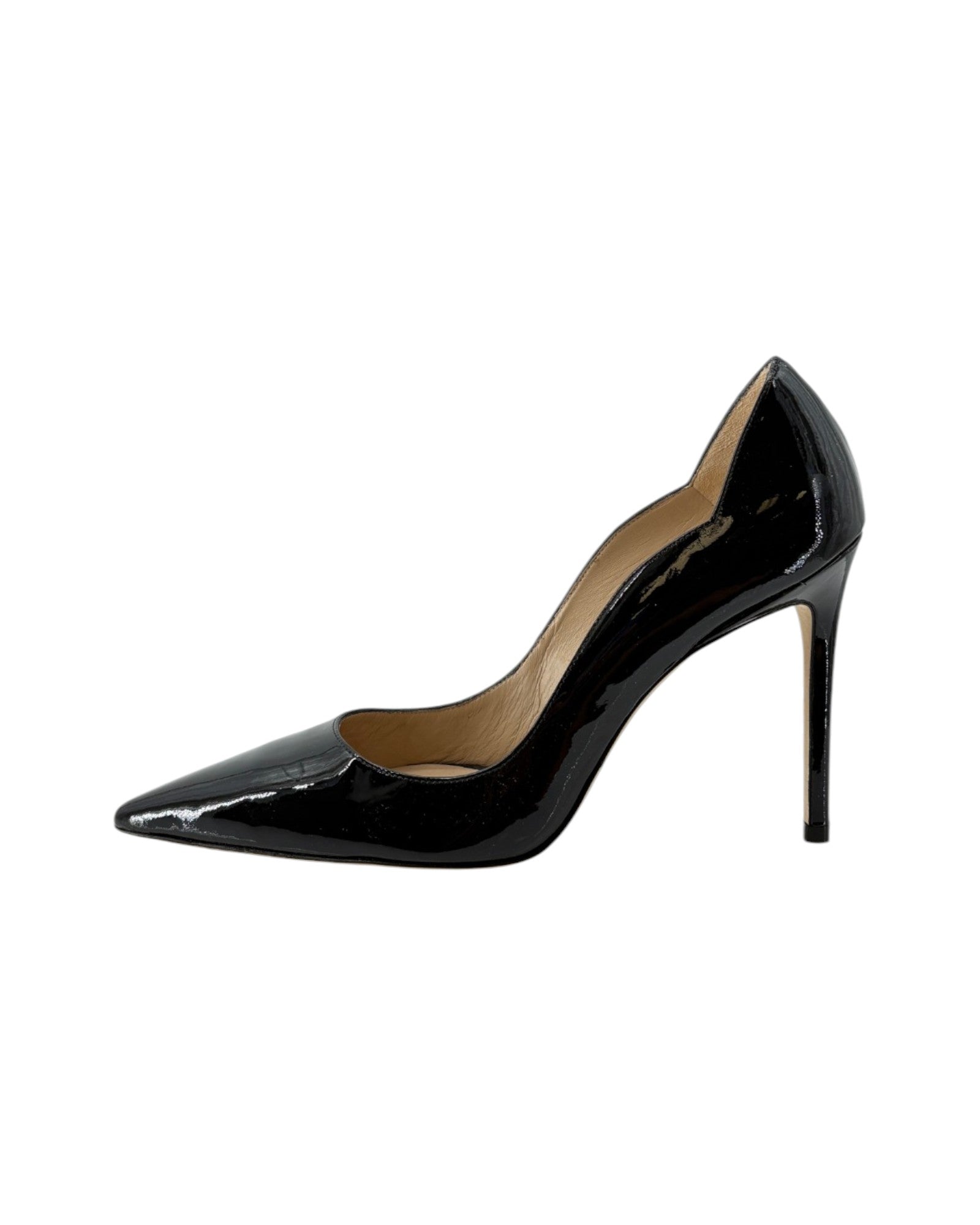 Black patent leather high heel shoe on a white background