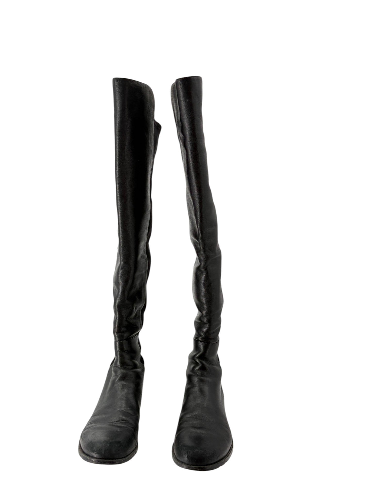 Black knee-high boots on a white background