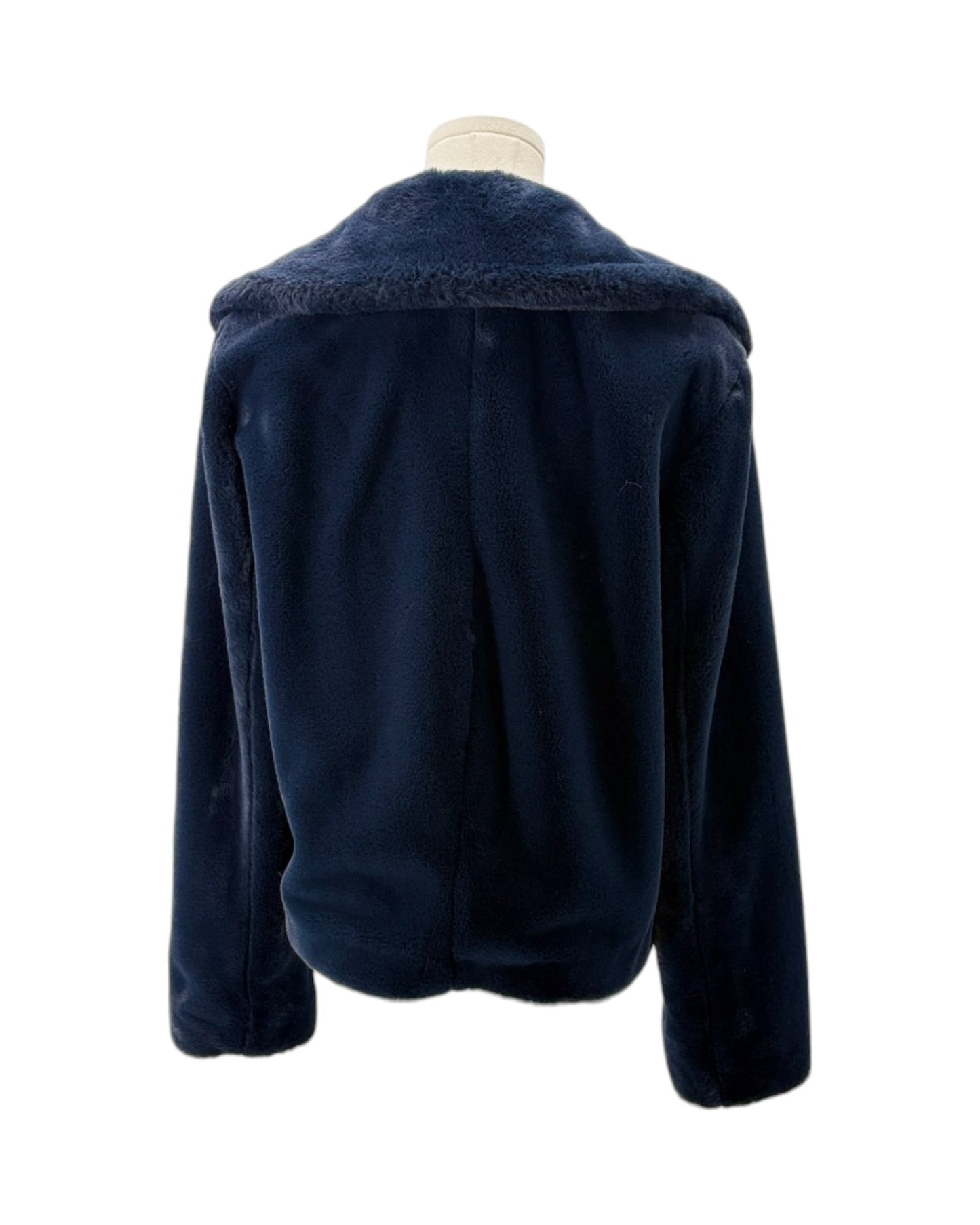 Navy blue jacket on a mannequin against a white background