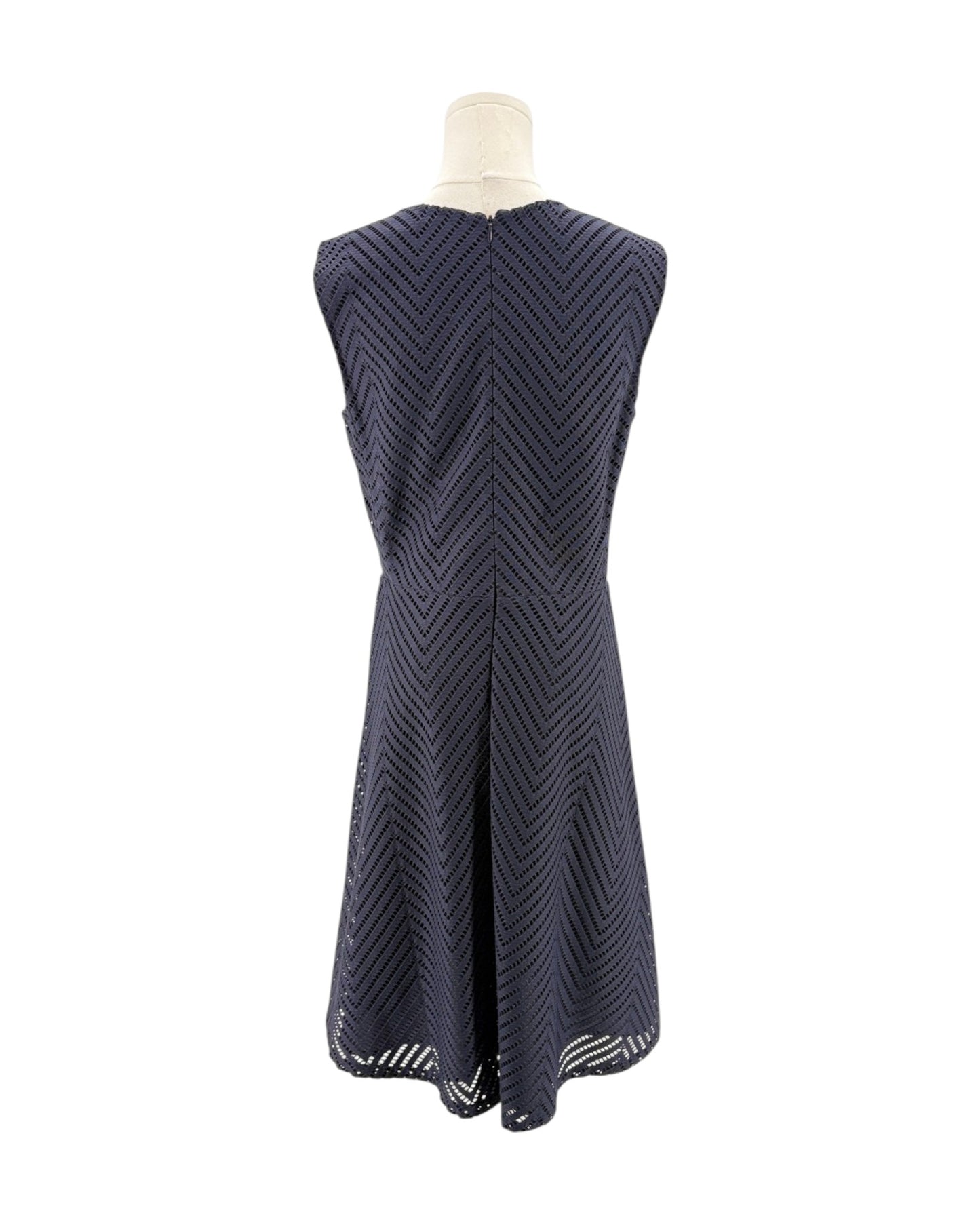 Navy blue sleeveless dress on a mannequin against a white background