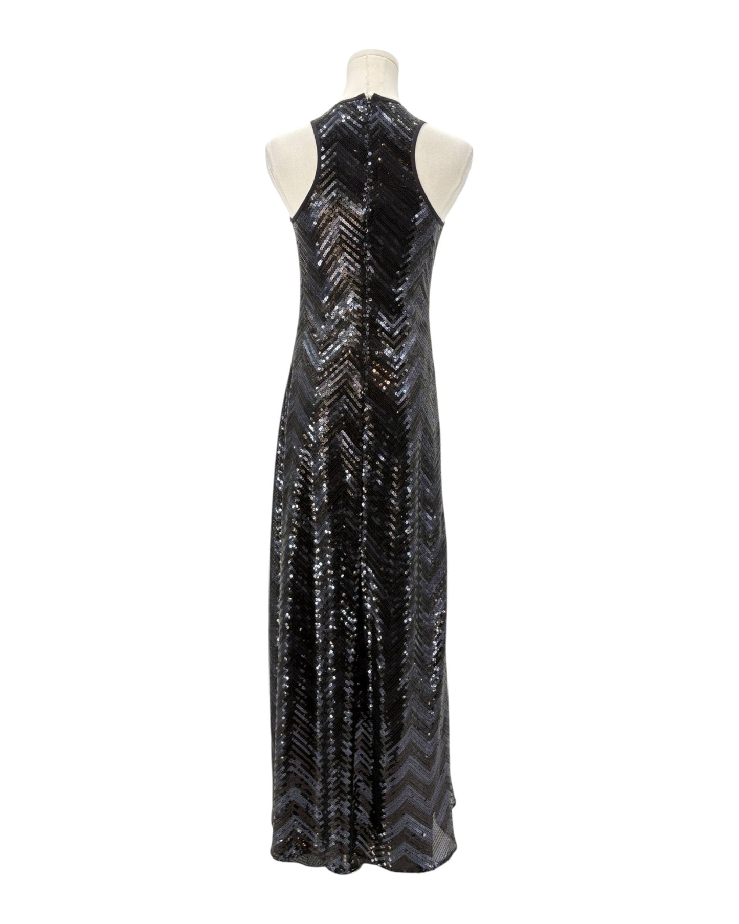 Black sequin evening gown on a mannequin against a white background