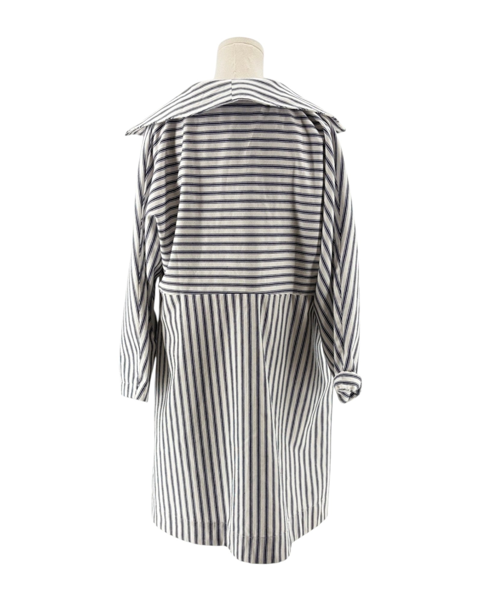 Striped mini dress on mannequin on a white background