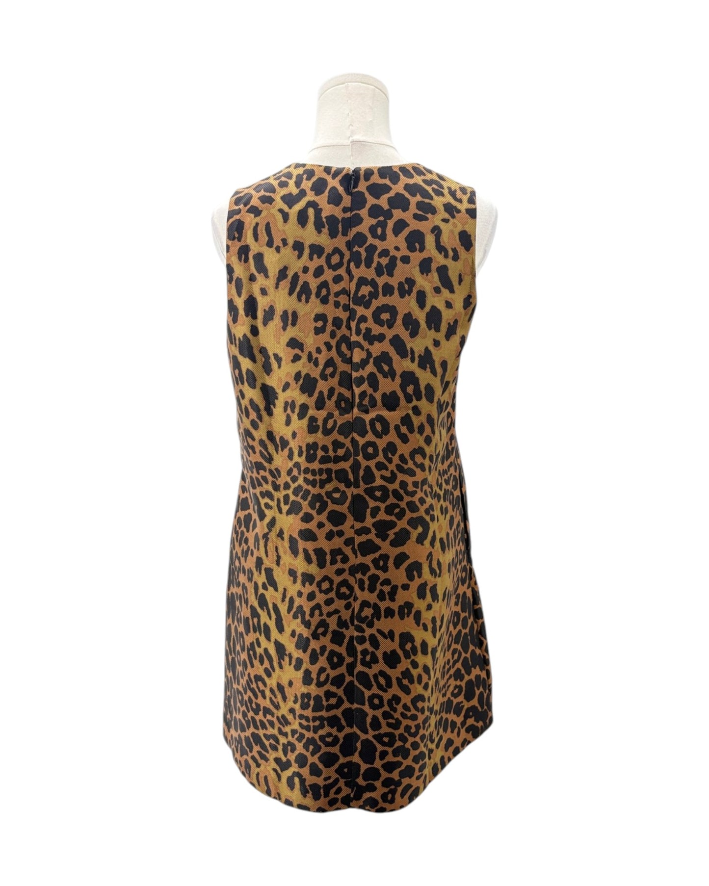 A sleeveless leopard print top displayed on a mannequin torso against a plain white background.