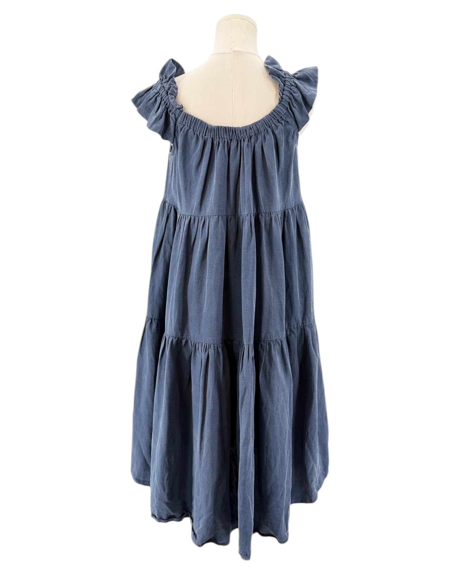 Blue dress on a mannequin against a white background