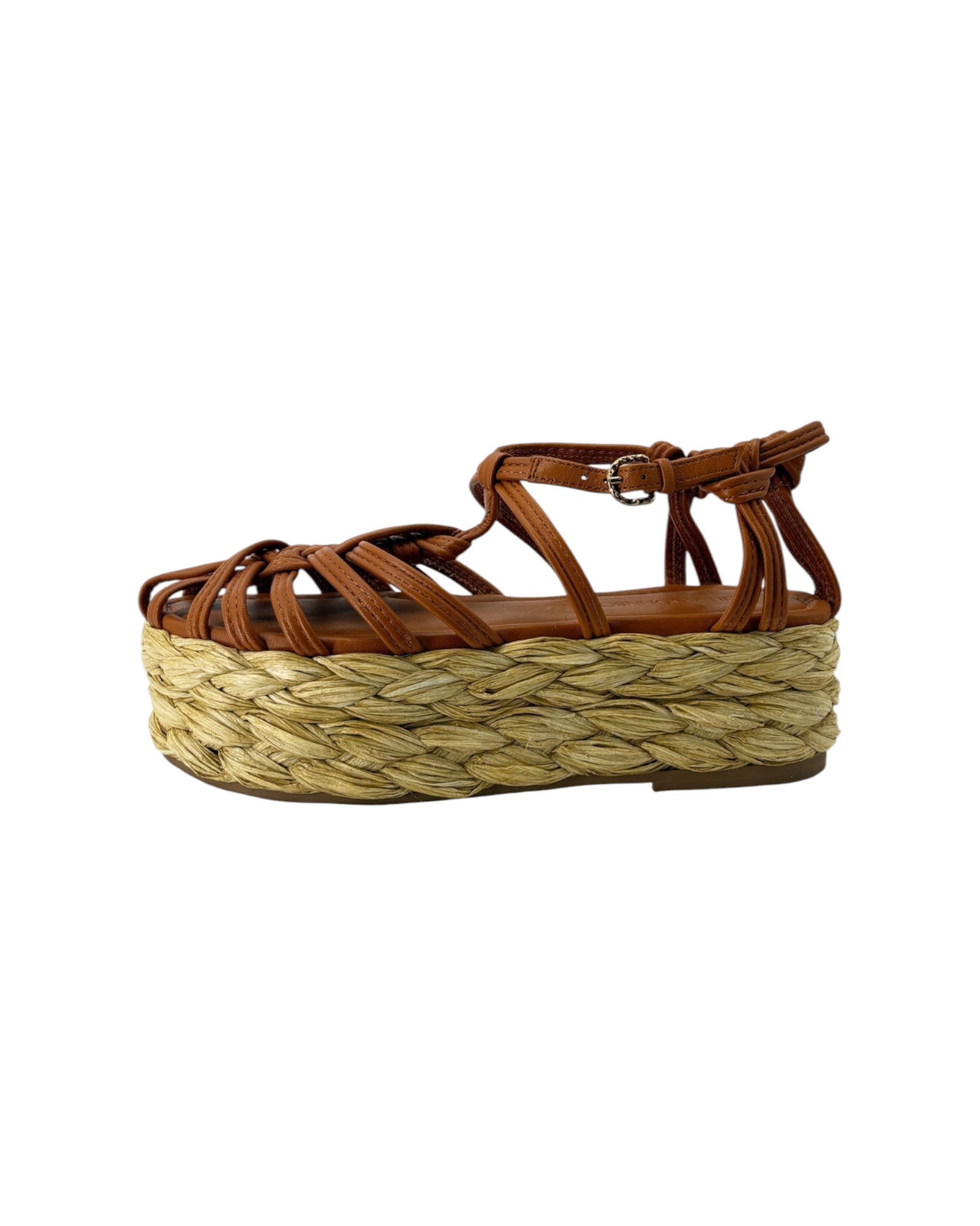 Brown sandal with woven platform sole on a white background