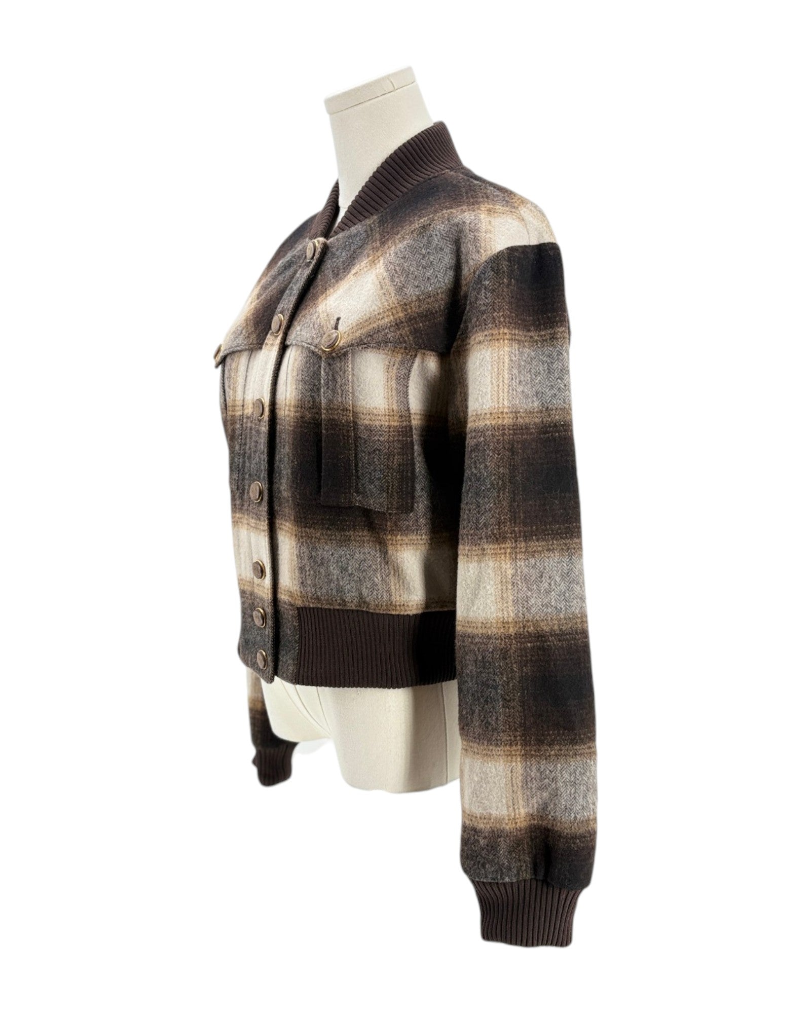 Plaid shirt on a mannequin against a white background