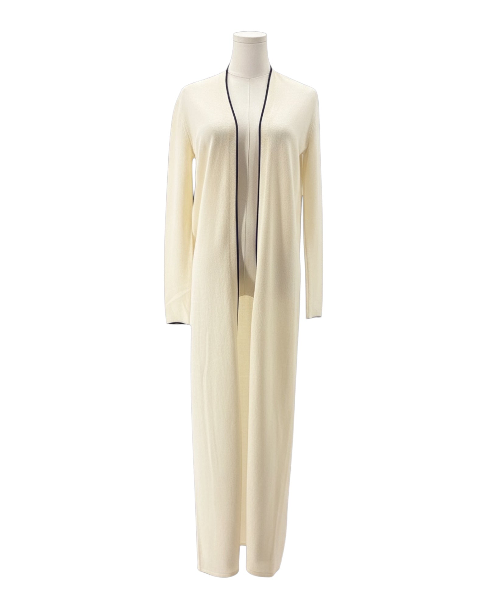 Long cream cardigan on a mannequin against a white background
